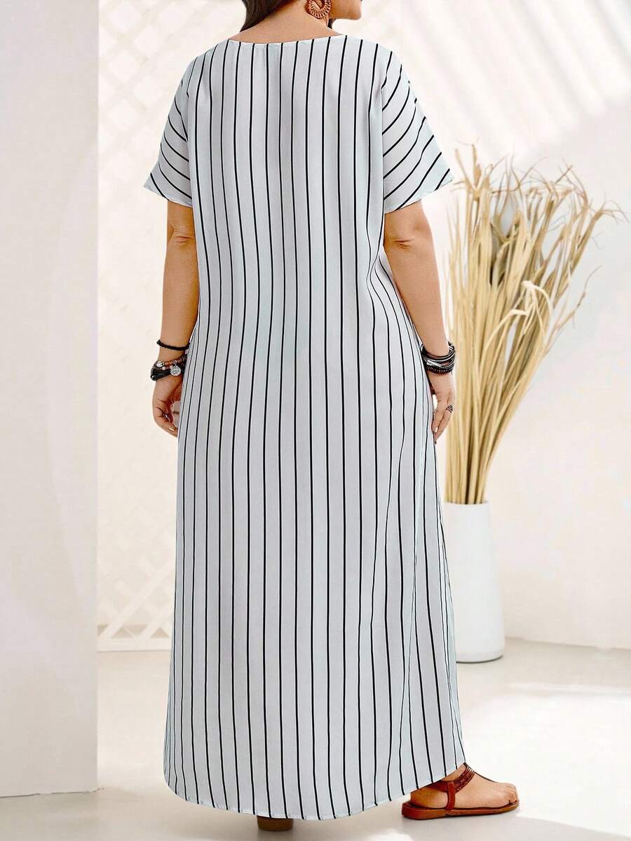 Embrace effortless style and comfort with this plus size long dress, featuring flattering batwing sleeves and classic stripes. Designed with practical side pockets, it’s ideal for warm spring and summer days. The breathable fabric ensures all-day ease, while the flowing silhouette complements your shape beautifully. Perfect for casual outings or relaxed gatherings, this dress combines functionality with timeless design.