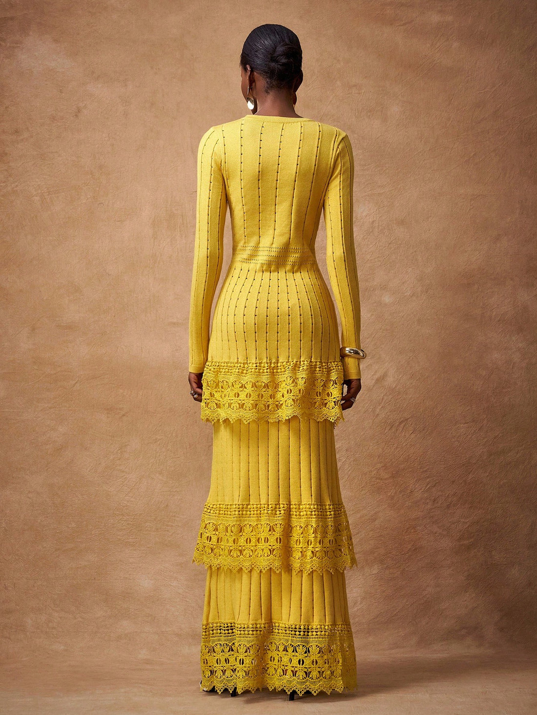 Elevate your seasonal wardrobe with this stunning mustard maxi dress, where rich color meets intricate lace patchwork details. Perfect for dancing through fall festivals, celebrating the holidays in style, or keeping it casual on everyday adventures, this versatile piece transitions seamlessly from one occasion to the next. The flowing silhouette flatters every figure while the warm mustard hue complements all skin tones beautifully. Whether you're layering it for cooler weather or pairing it with your favo