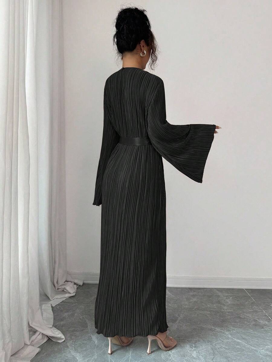 Twirl into sophistication with this stunning midi dress that's equal parts graceful and fun. The flared sleeves add a whimsical touch while the pleated waist tie cinches your silhouette beautifully, creating an effortlessly chic look. Perfect for brunch dates, garden parties, or whenever you want to feel like the most elegant version of yourself. This dress proves that timeless style doesn't have to be boring—it just has to be this good.