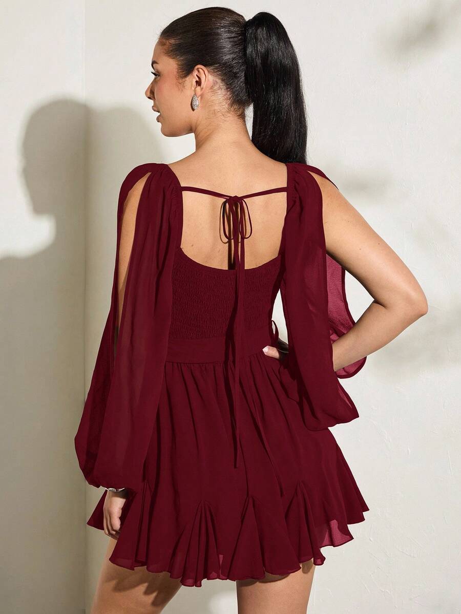 Back view burgundy chiffon mini dress with open tie back shirred bodice and layered ruffle skirt