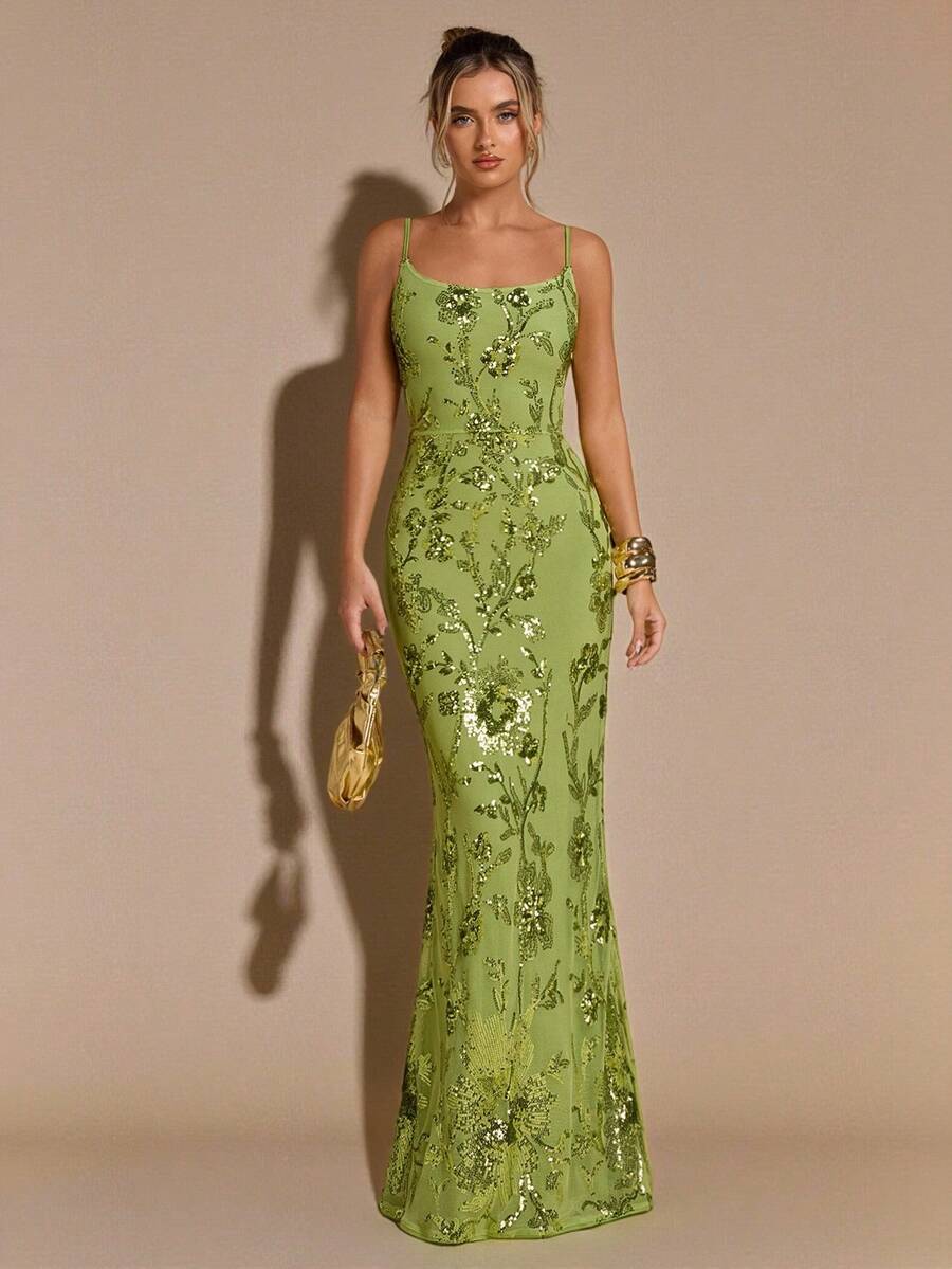 Elevate your special occasion wardrobe with this stunning green maxi dress. Featuring intricate 3D floral embroidery and delicate sheer detailing, this piece combines elegance with modern flair. The backless design with tie straps creates a sophisticated silhouette, while the high-waisted mermaid hem flatters your figure. Lined for comfort and crafted from a premium polyester-elastane blend, it's perfect for weddings, formal events, and unforgettable celebrations. Hand wash to maintain its beauty.