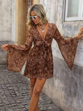 Brown paisley deep V mini dress with wide bell sleeves front view
