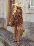 Brown paisley boho mini dress with deep V neck and bell sleeves full front