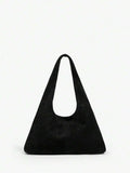 Vintage shoulder bag close-up with double handle detail
