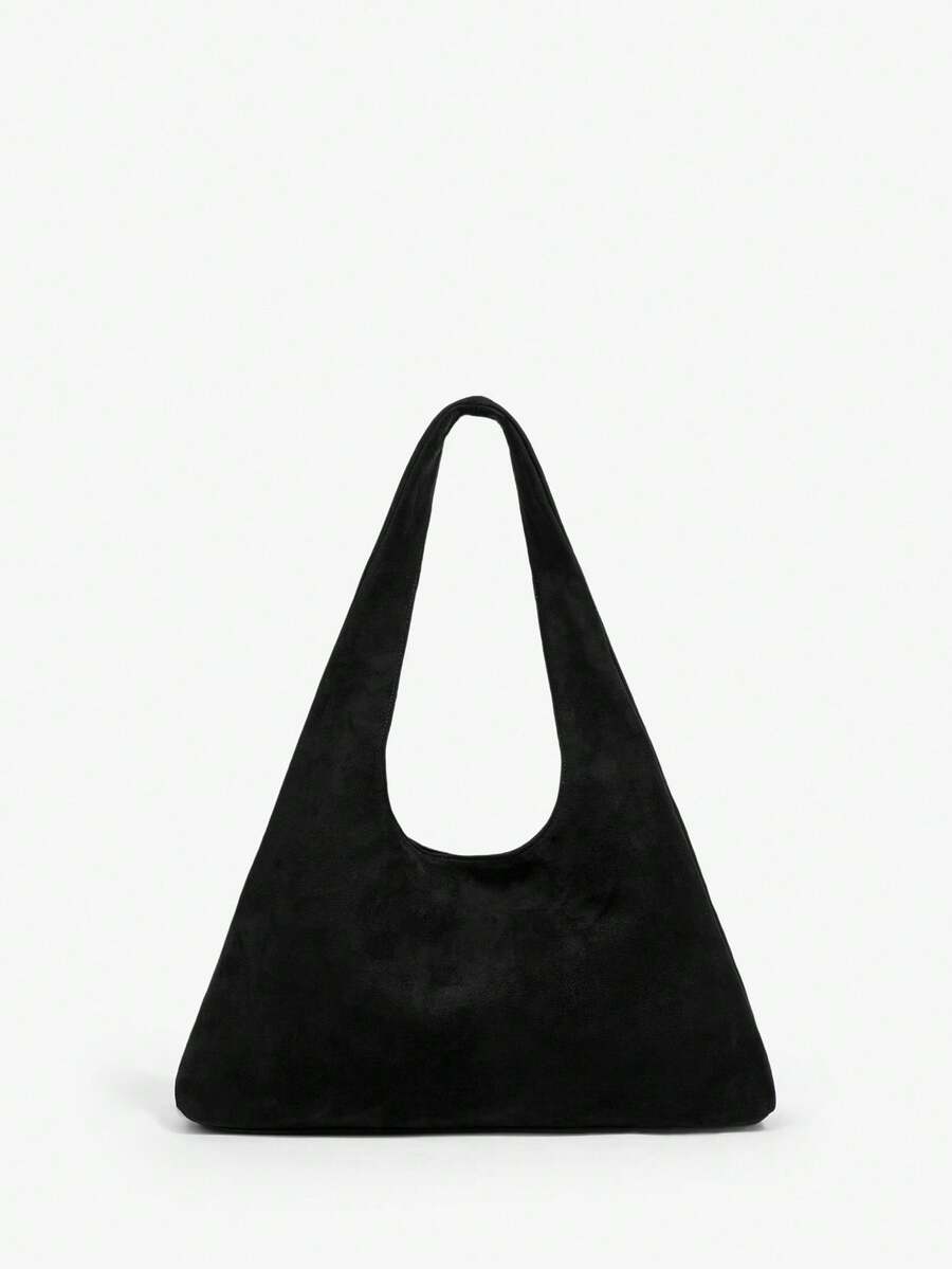 Vintage shoulder bag close-up with double handle detail