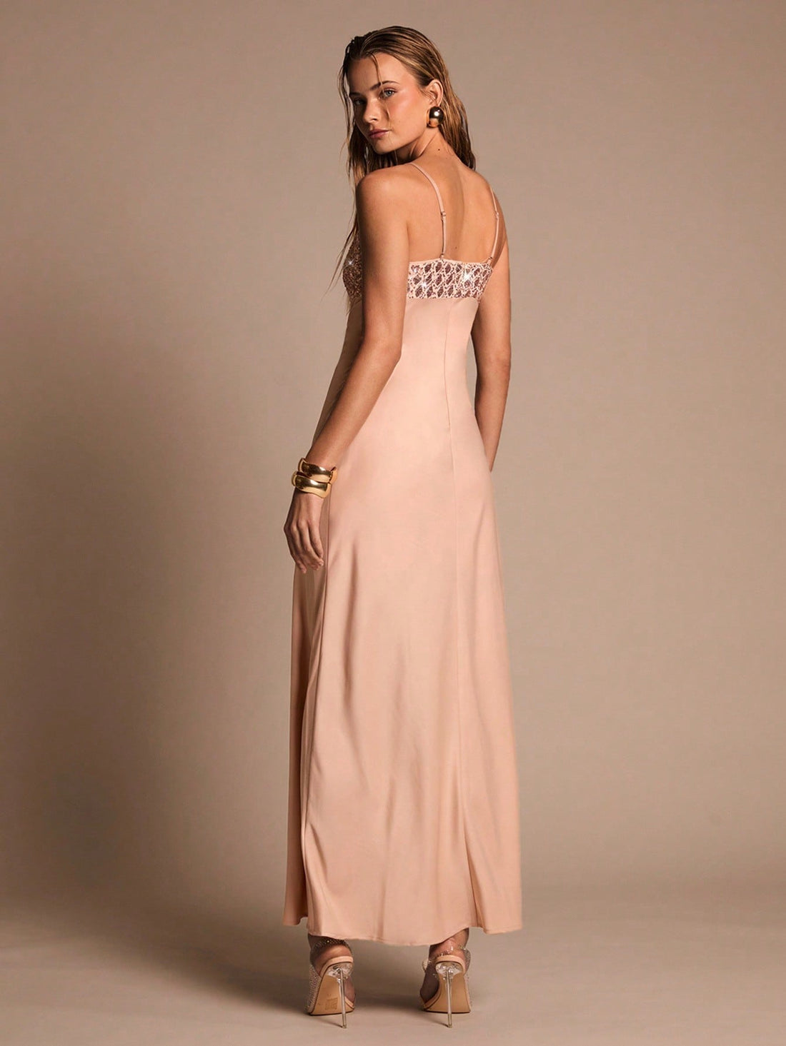 Make a statement at your next event in this show-stopping sequin patchwork dress! Featuring bold color-blocking and shimmering sequin details, this piece transforms you into the life of the party. The playful mix of textures and hues creates an eye-catching look that's equal parts fun and fabulous. Perfect for cocktail nights, celebrations, or whenever you want to turn heads and feel absolutely amazing. Slip it on and let your confidence shine as bright as those sequins!