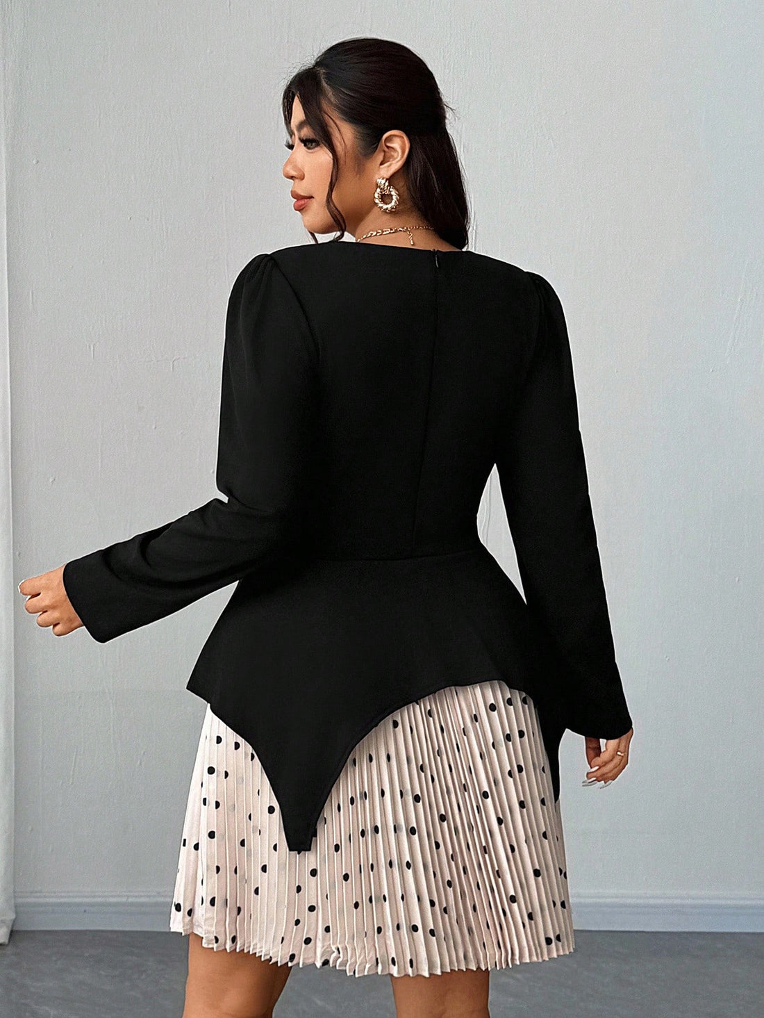 Embrace your curves with confidence in this stunning plus-size dress that celebrates your silhouette. The chic square neckline draws attention upward while long sleeves provide elegant coverage, striking the perfect balance between bold and sophisticated. A playful pleated hem adds movement and dimension, creating a flattering drape that skims beautifully over your frame. Whether you're heading to brunch, a night out, or anywhere in between, this dress delivers that sexy-yet-classy vibe that makes you feel 