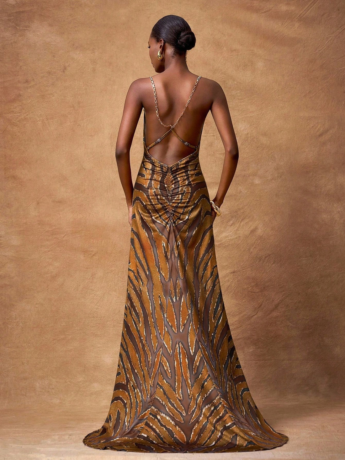 Make a statement with this stunning zebra print long dress that effortlessly transitions from day to night. The bold, eye-catching pattern brings instant personality to your wardrobe, while the flowing silhouette flatters every figure. Whether you're heading to a party, jet-setting across the globe, or simply elevating your everyday look, this versatile piece has you covered. Comfortable enough for all-day wear yet chic enough to turn heads, it's the dress that does it all. Embrace your wild side with timel