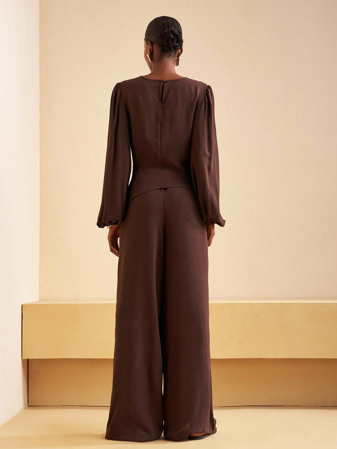 Elevate your wardrobe with this stunning 2-piece set that's basically a style cheat code! The asymmetric satin blouse drapes beautifully with modern flair, while the high-waist wide-leg pants create a flattering silhouette that works from office to dinner. The luxe satin finish catches the light just right, giving you that effortlessly polished look without trying too hard. Perfect for layering through fall and winter, this dynamic duo transitions seamlessly from day to night. Mix, match, and own every mome