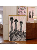 Pink animal print gallery wall set in a modern room