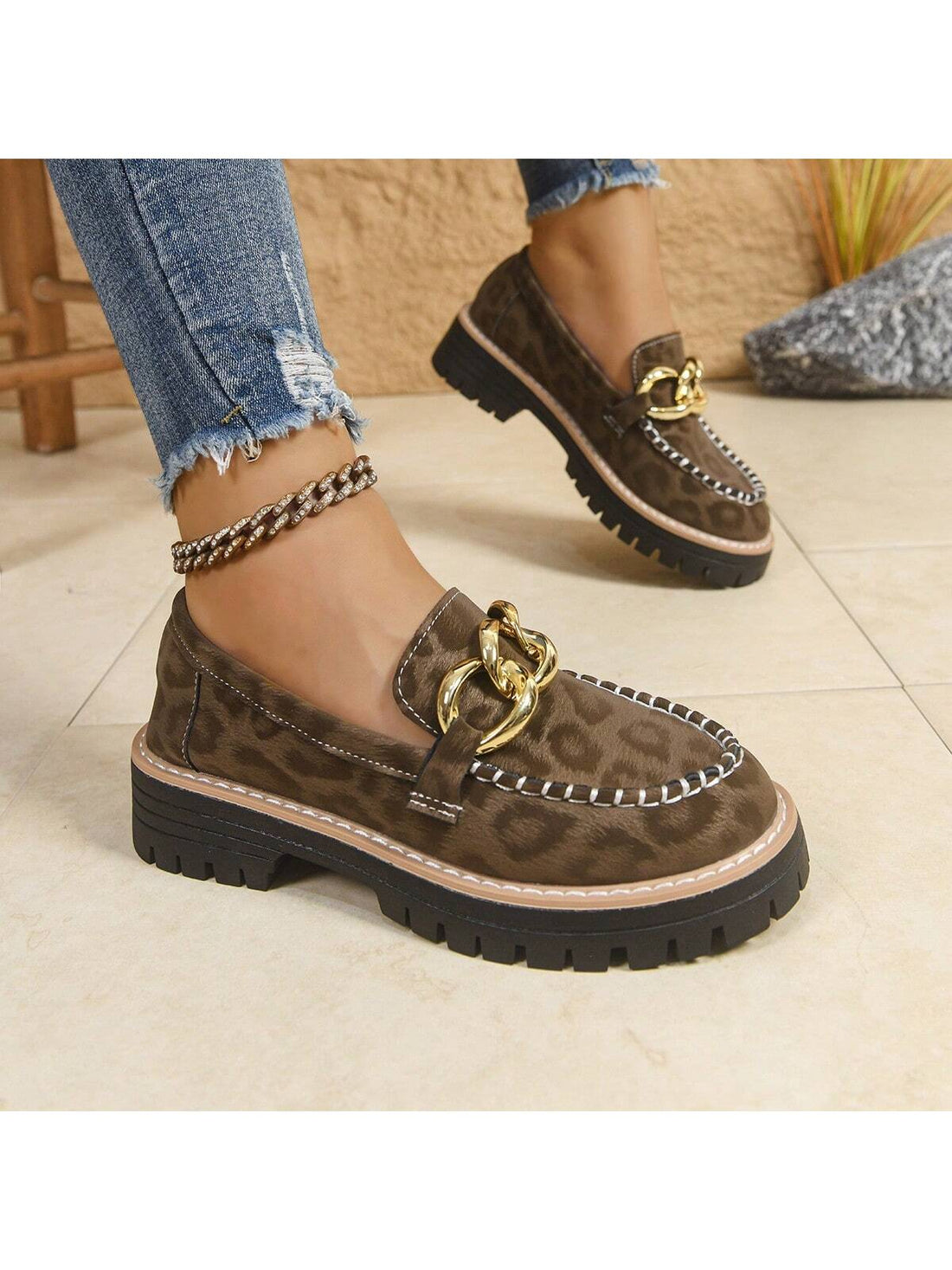 Elevate your casual wardrobe with these stylish women's leopard print platform loafers, designed for both comfort and versatility. Featuring a sleek metal buckle accent, these shoes combine trendy animal print with a modern platform sole to provide added height without sacrificing support. Ideal for everyday wear, they easily transition from day to night, complementing a variety of outfits while ensuring all-day comfort. Perfect for those who value fashion and functionality in one chic package.