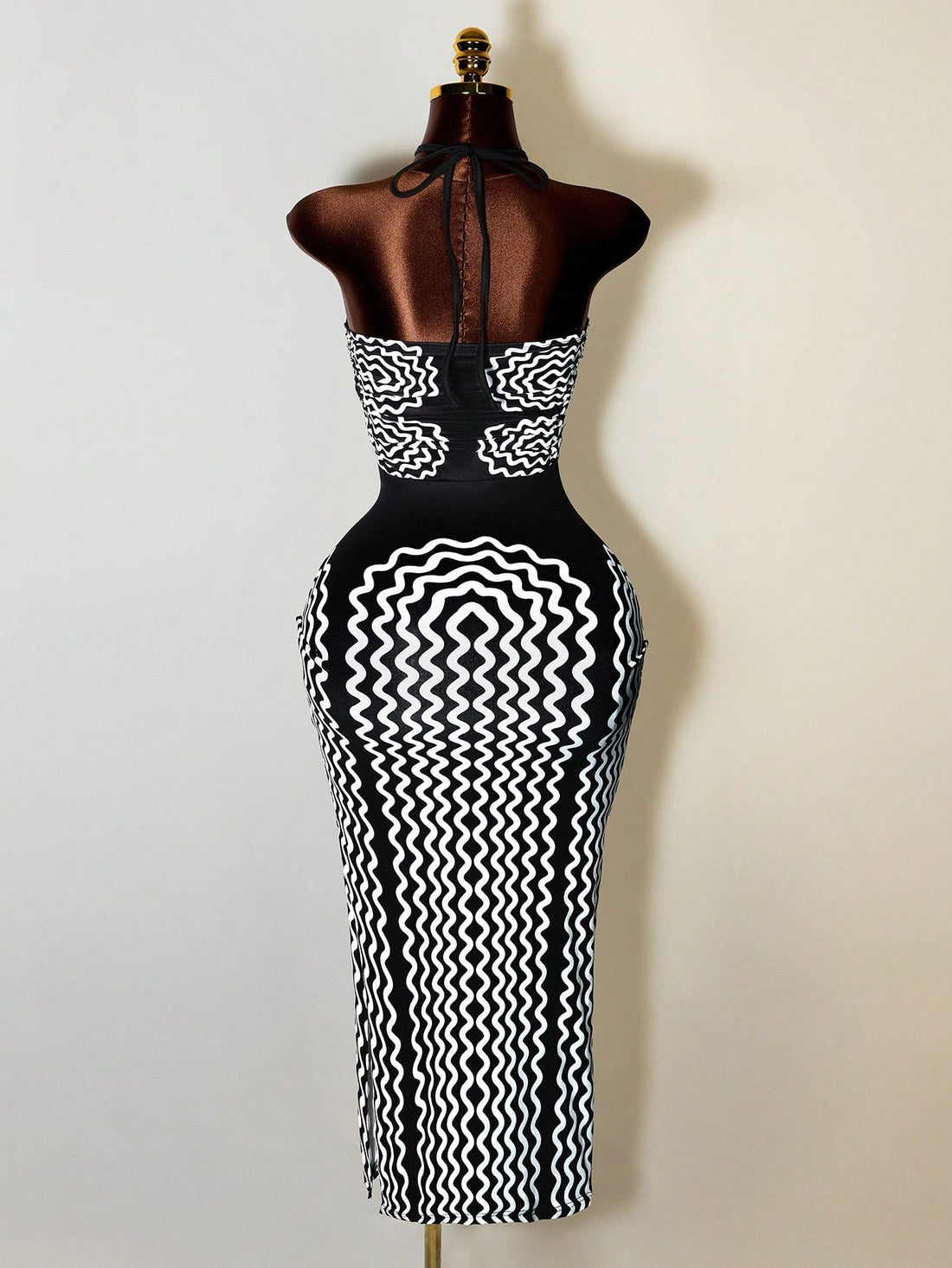 Turn heads with this playful yet elegant halter bodycon dress, featuring chic stripes and a flirty hollow-out design. The criss-cross neckline adds a fun twist, perfect for making a stylish statement at any event. Embrace your confidence in this figure-hugging dress that’s as charming as it is unique.