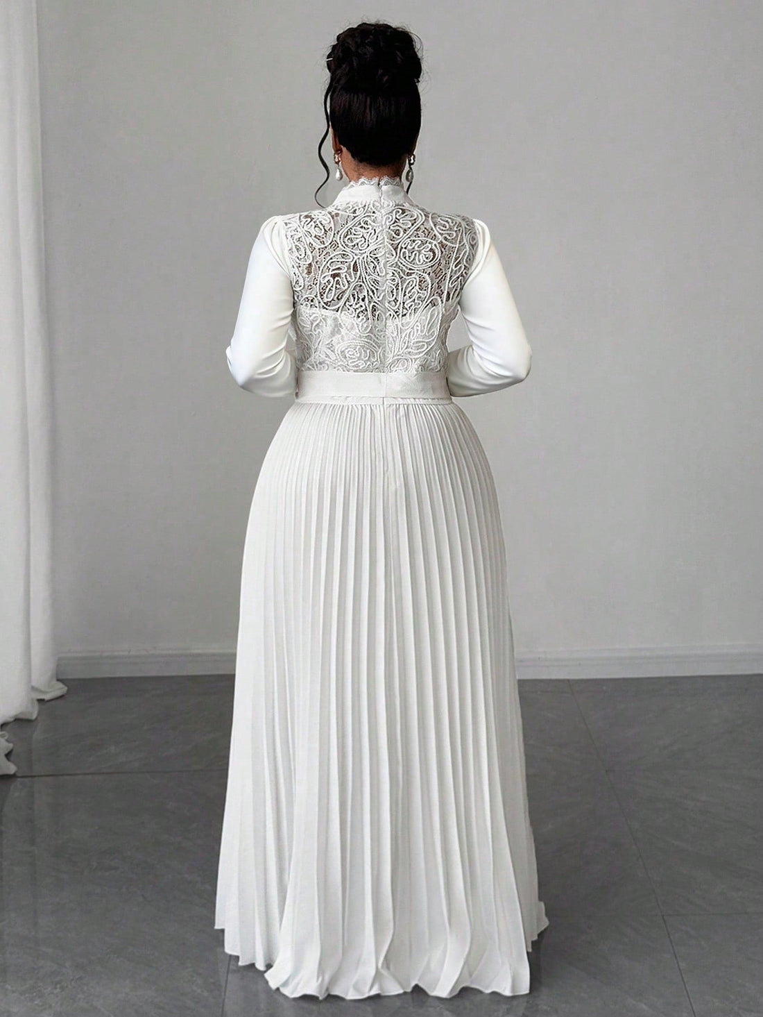 Embrace your curves with confidence in this stunning patchwork long dress that celebrates your unique style. Featuring a flattering waist-cinch design that accentuates your silhouette, this elegant piece combines artistic patchwork detailing with timeless sophistication. Perfect for special occasions or elevated everyday wear, the flowing length and thoughtful construction ensure you'll feel fabulous and fashion-forward. A wardrobe essential that proves plus-size fashion can be both chic and playfully bold.