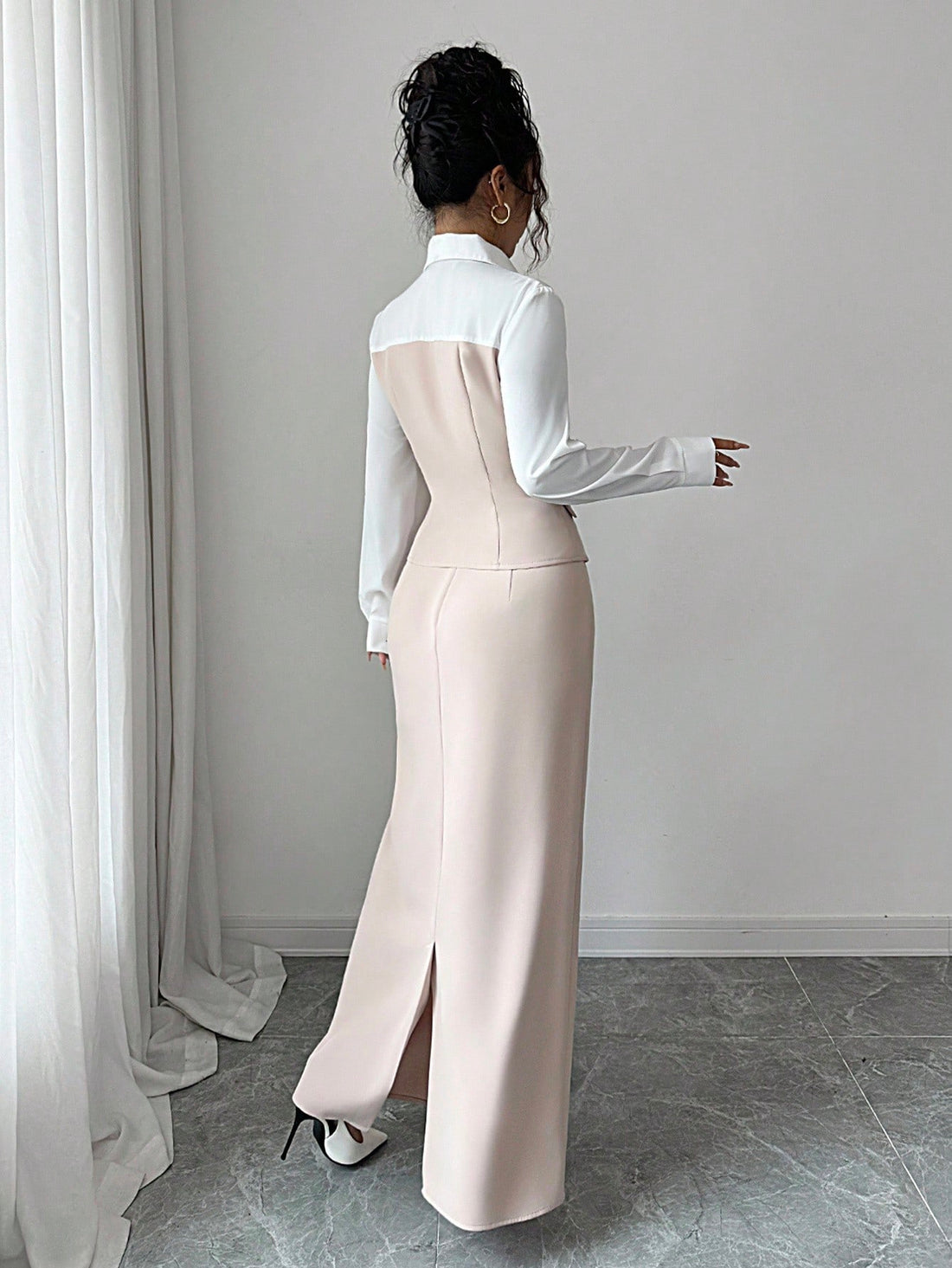 Elevate your autumn wardrobe with this chic color block dress set that effortlessly transitions from office to weekend plans. The minimalist design features thoughtfully placed color blocking that flatters your silhouette while keeping things refreshingly simple. Perfect for those crisp early fall days when you want to look polished without overthinking it. Mix and match the pieces for endless styling possibilities, or wear them together for an instantly put-together look. Comfortable enough for your daily 