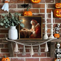 Santa and Baby Jesus devotional canvas in an ornate gold frame