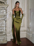 Olive satin gown front view styled with matching gloves, showing its fitted shape and slit