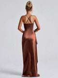 Copper-brown satin gown back view with crossed straps and floor-length skirt