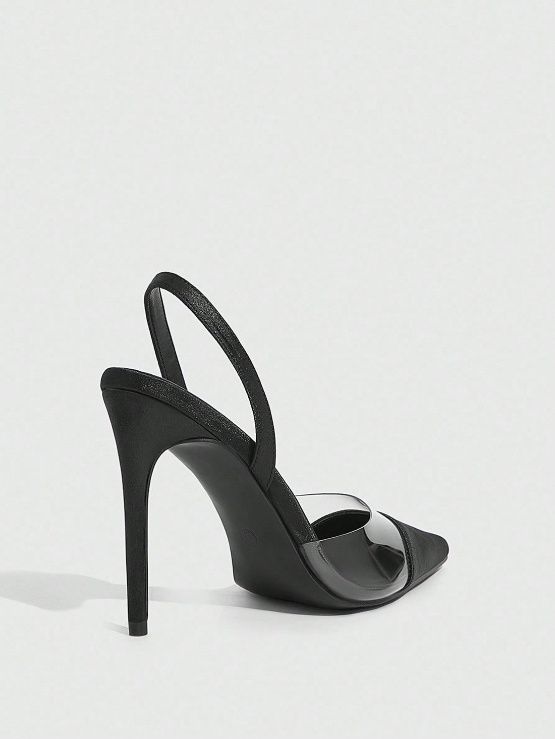 Step into sophistication with these show-stopping black satin stiletto pumps. Featuring a chic patchwork design paired with striking transparent TPU elements, they're the perfect blend of edgy and elegant. The sleek satin finish catches the light beautifully, while the modern mixed-material aesthetic makes them a conversation starter. Whether you're heading to a night out or elevating your everyday look, these pumps deliver instant glamour and undeniable style. A wardrobe essential for anyone who loves maki