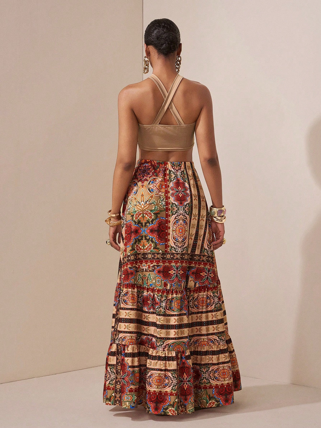 Escape to relaxation in this dreamy two-piece set that practically packs itself! The silky brown camisole pairs perfectly with a flowing long skirt, creating an effortless look that transitions seamlessly from beachside brunch to sunset strolls. Whether you're lounging by the pool or exploring a new destination, this versatile duo keeps you looking put-together without the fuss. Comfort meets style in every wear—your vacation wardrobe just got a whole lot easier!