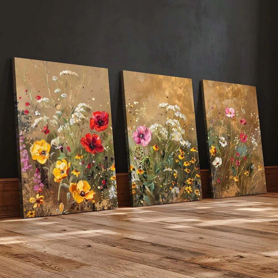 Three colorful wildflower canvas panels above a cream bed with a rattan pendant light