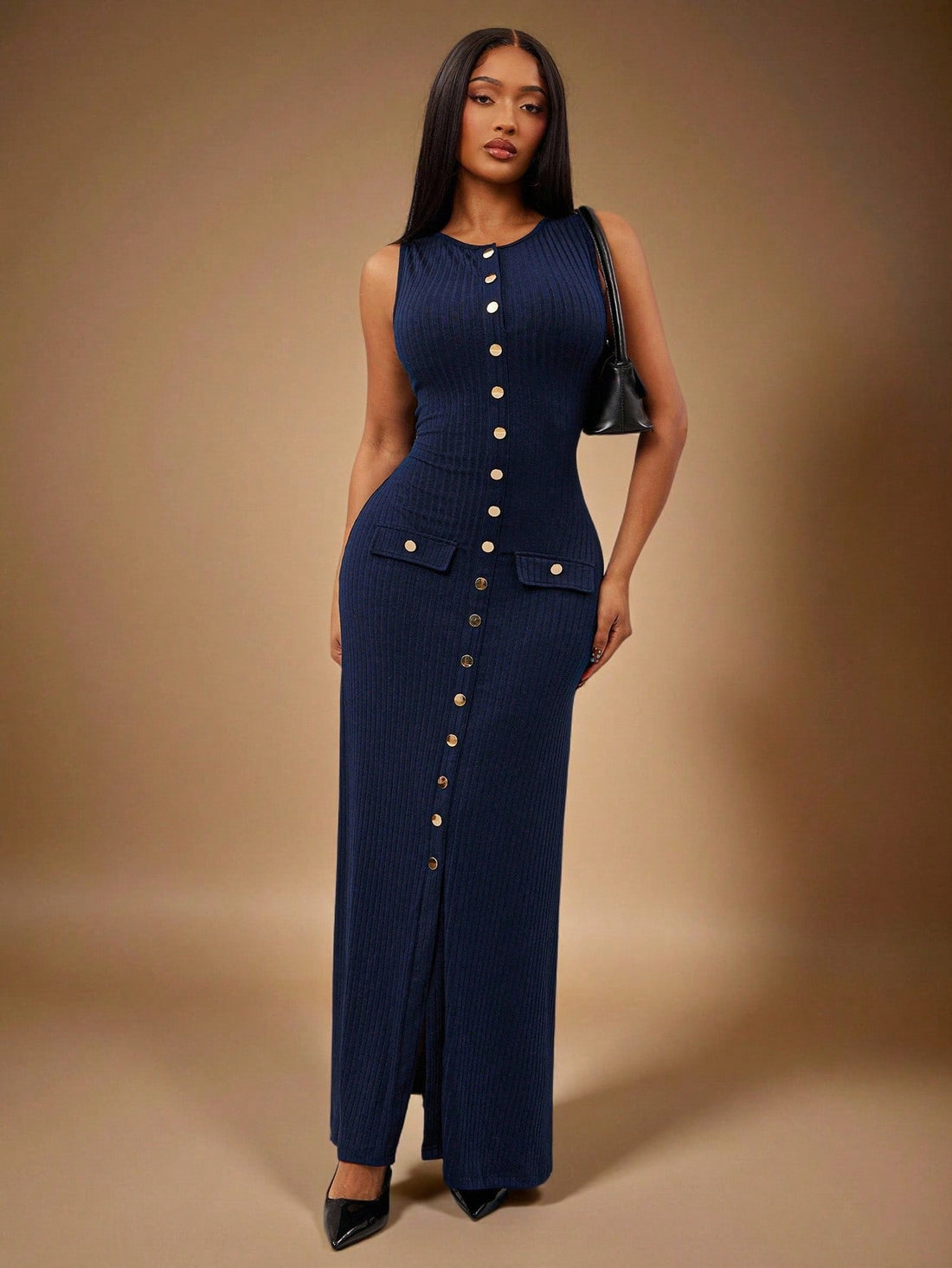 Step out in style with this elegant navy blue sleeveless maxi dress made just for women who want to shine whether at the office or out on the town. Its sleek silhouette offers effortless sophistication, while the flowing fabric ensures you'll stay comfortable all day long. Dress it up with heels for business meetings or pair with flats for a casual brunch—this versatile maxi dress is your go-to for every occasion!
