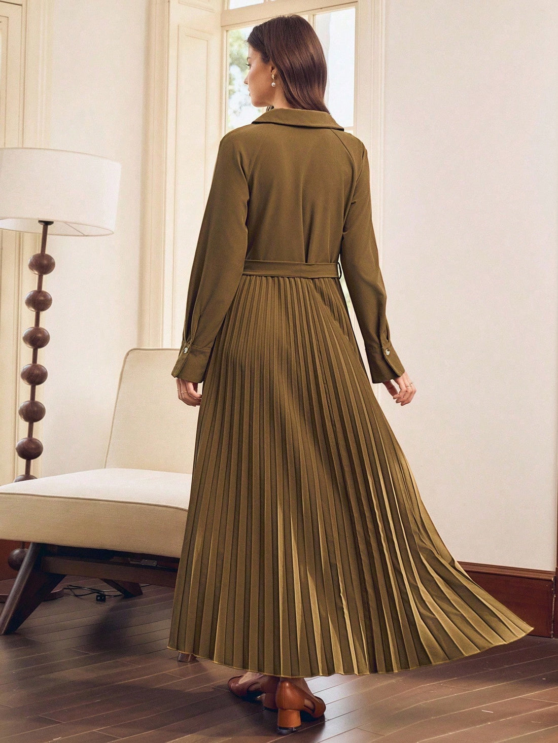 Twirl into the season with this stunning pleated dress that effortlessly blends romance with sophistication. The delicate pleating adds graceful movement and dimension, while the refined silhouette flatters every figure. Perfect for autumn and winter gatherings, this versatile piece transitions seamlessly from brunch to evening events. Crafted with elegance in mind, it's the dress you'll reach for again and again when you want to feel absolutely fabulous.