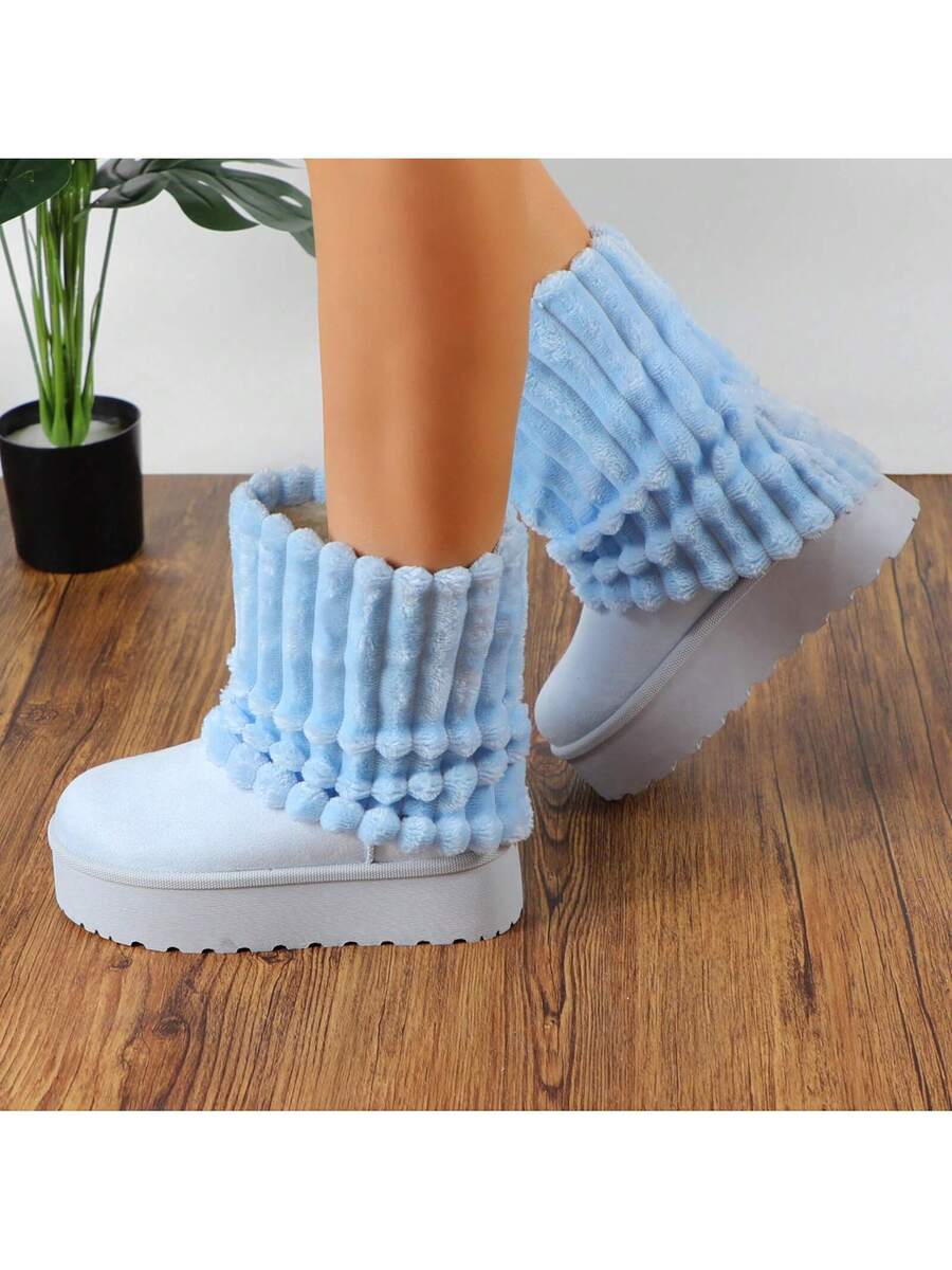 Step into comfort and style with these fleece-lined platform fur boots, engineered for both warmth and stability. The plush interior insulation keeps your feet cozy through cold weather, while the anti-slip sole provides secure footing on any surface. The elevated platform silhouette offers a modern aesthetic that pairs effortlessly with casual and dressed-up looks alike. Crafted with quality construction, these ankle booties deliver the perfect balance of fashion-forward design and practical everyday weara