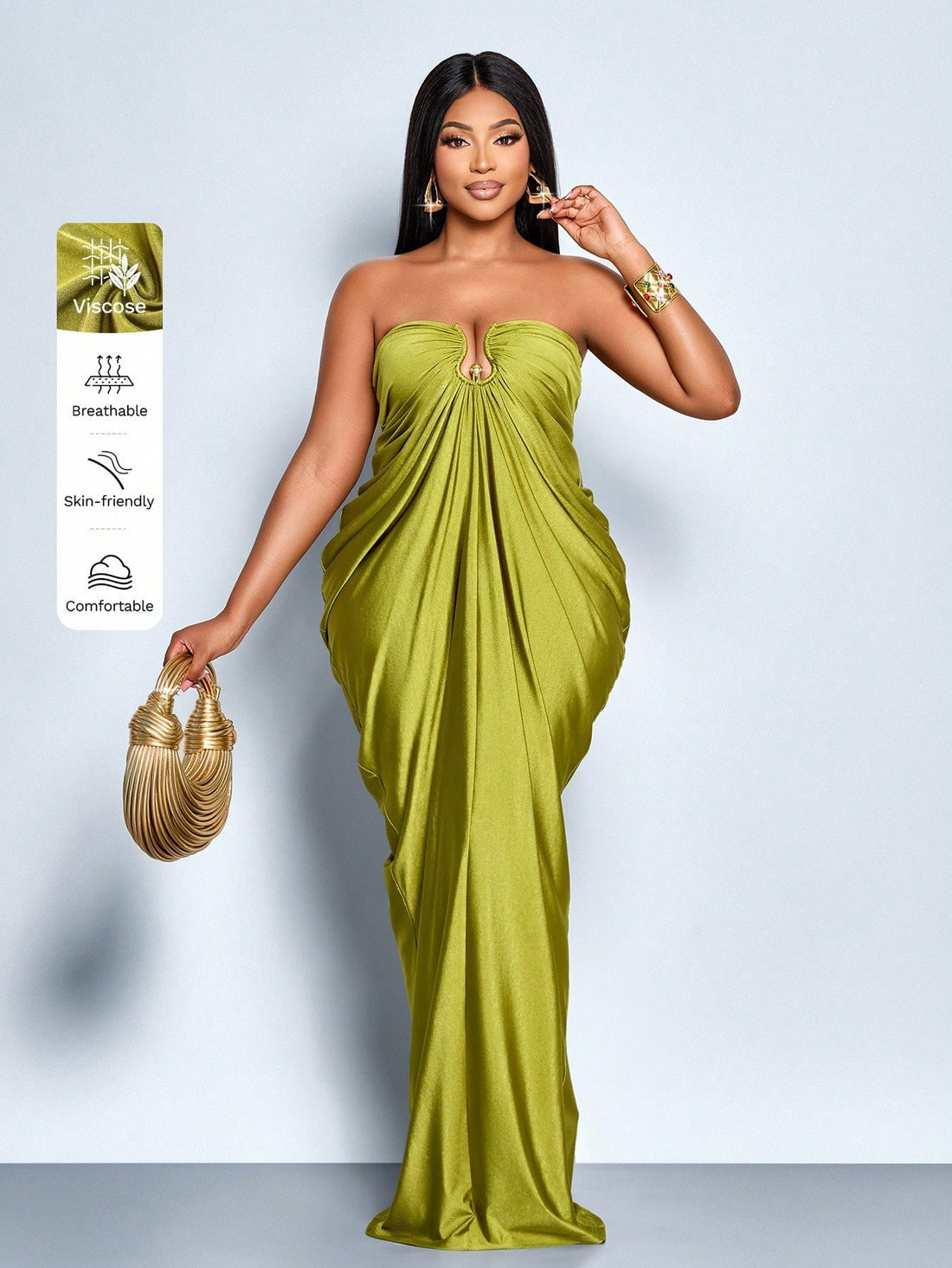 Slip into effortless elegance with this plus-size tube maxi dress that's ready to turn heads all season long. The rich grass green hue pairs beautifully with strategic ruching that flatters your silhouette, while delicate metal accents and graceful pleats add just the right amount of sophistication. Perfect for fall and winter gatherings, this dress transitions seamlessly from casual outings to special occasions. The tube design offers a sleek, modern look that celebrates your curves with confidence and sty