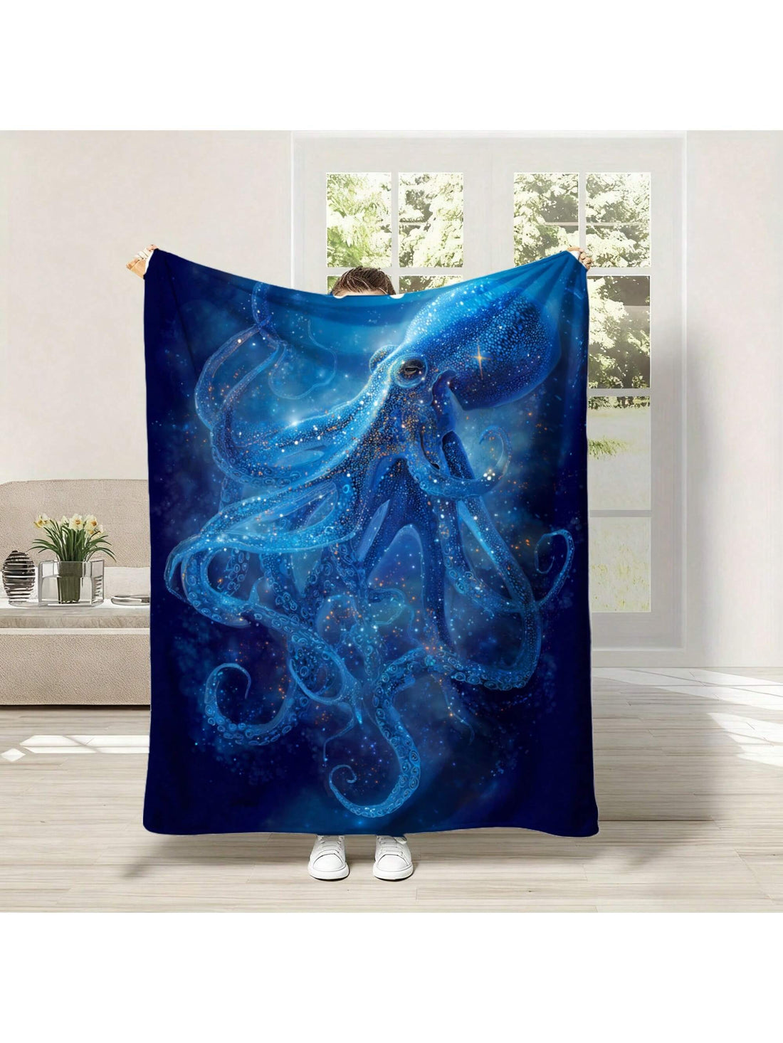 Wrap yourself in oceanic charm with the Cozy Blue Octopus Throw Blanket. Featuring a playful deep-sea octopus design, this soft blanket adds a splash of marine magic to your living room or bedroom. Perfect for cozying up during a movie night or adding a stylish touch to your decor, it brings both comfort and sea-inspired fun in one. Dive into warmth and whimsy!