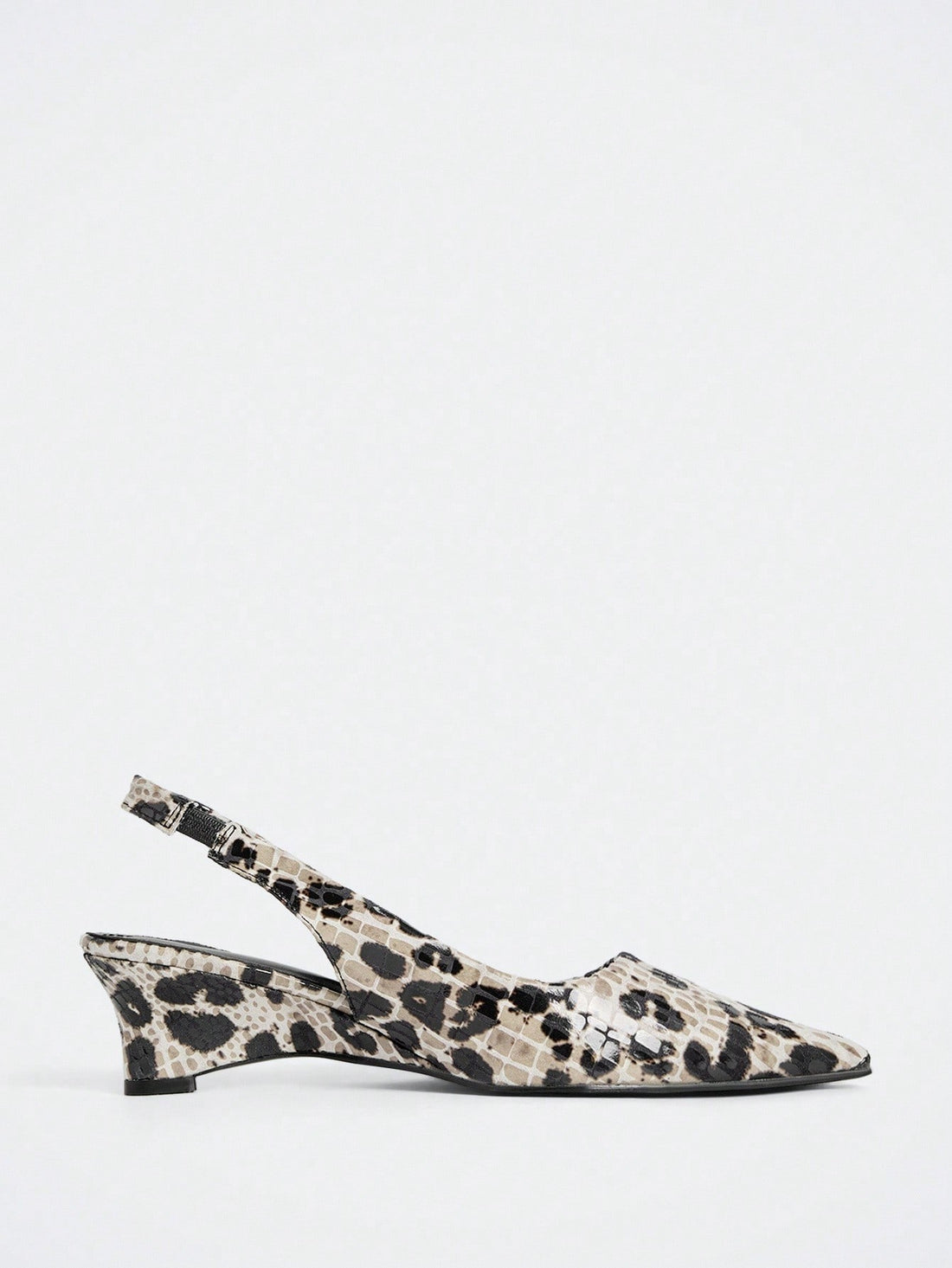 Step into sophistication with these apricot wedge pumps that prove comfort and style aren't mutually exclusive. The gentle wedge heel provides all-day wearability without sacrificing that polished look you're after. Whether you're dressing up for brunch or heading to the office, this warm, versatile shade pairs effortlessly with everything from denim to dresses. The thoughtful design keeps your feet happy while turning heads—because who says you can't have it all?