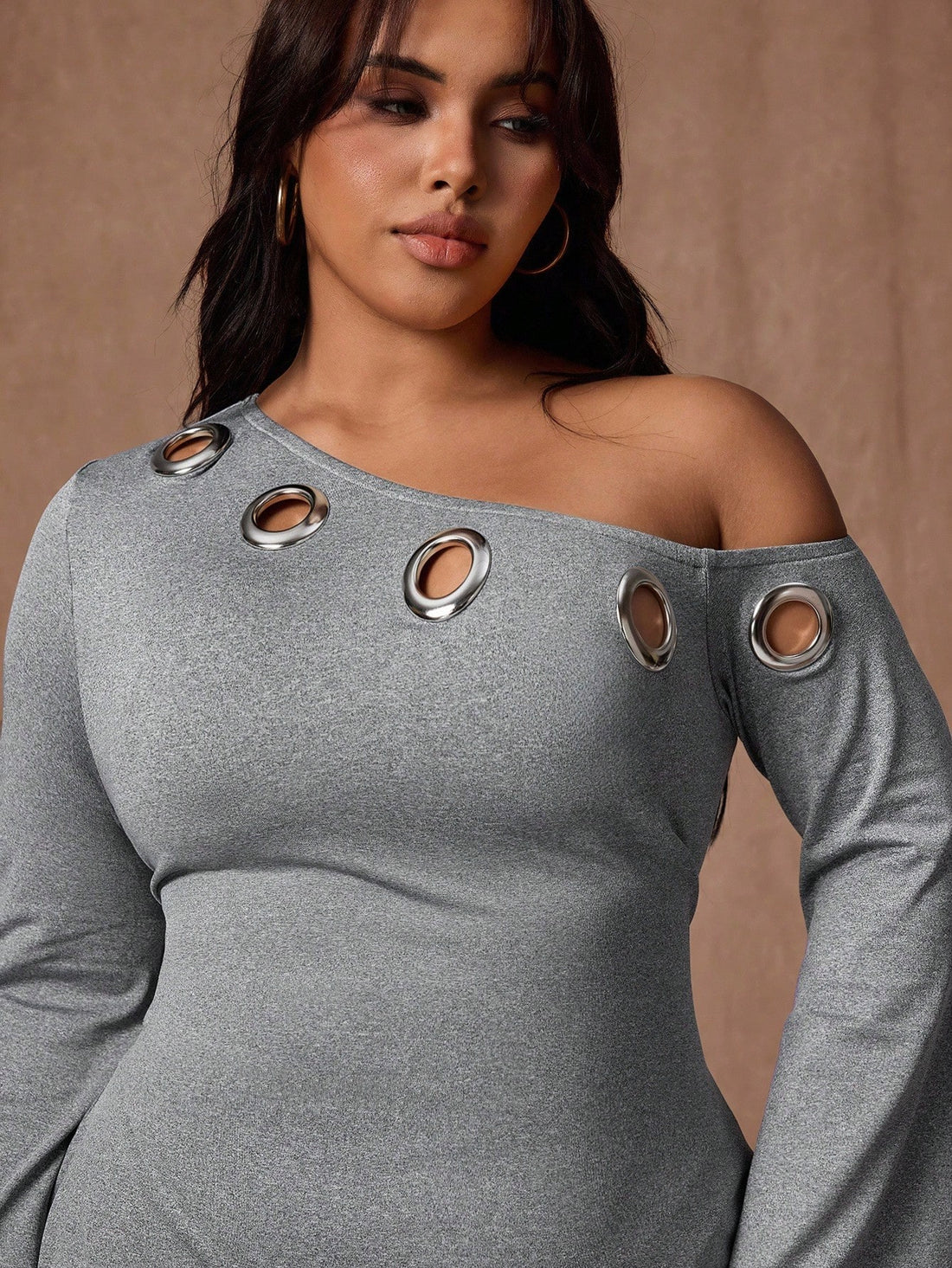 Embrace your curves with this fabulous plus-size dress that's equal parts chic and comfortable! Crafted from soft polyester, this casual number features a trendy asymmetrical shoulder design and delicate eyelet detailing that adds just the right amount of flair. The solid color keeps things versatile, making it perfect for everything from weekend brunches to casual date nights. Slip it on and feel confident, stylish, and ready to turn heads wherever you go!