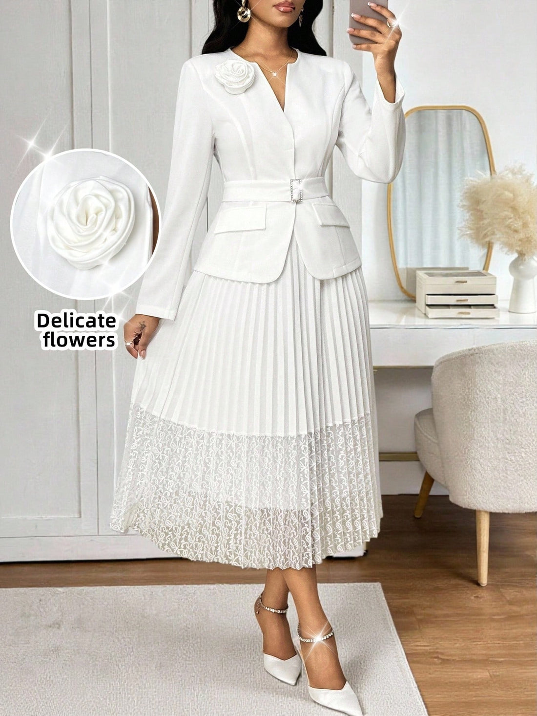 Make a statement at your next special occasion with this stunning two-piece set! The intricately crafted 3D floral jacket adds dimension and drama, while the delicate lace pleated midi skirt brings timeless elegance. Perfect for weddings, parties, and celebrations, this ensemble combines sophisticated details with modern flair. The jacket's textured florals pair beautifully with the skirt's flowing pleats, creating a look that's both refined and unforgettable. Dress it up with heels and jewelry for an insta