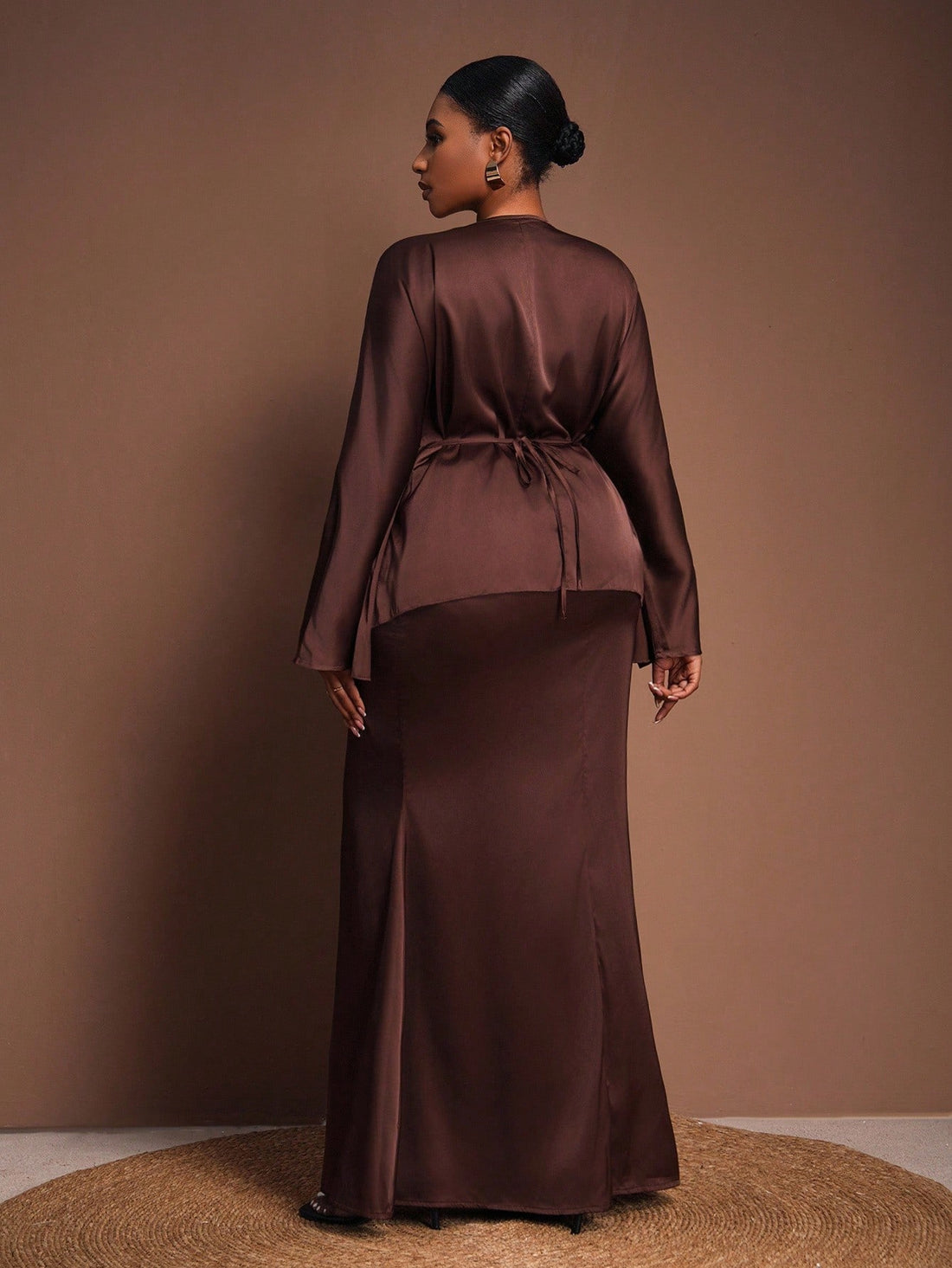 Elevate your formal wardrobe with this stunning two-piece set designed for the modern, confident woman. The sophisticated crossover top flatters your silhouette while the flowing straight long skirt creates an effortlessly chic look perfect for fall and winter occasions. Whether you're heading to a gala, dinner party, or special event, this elegant ensemble combines comfort with timeless style. The thoughtful design celebrates your curves while keeping you feeling fabulous from day to night. Dress it up wit