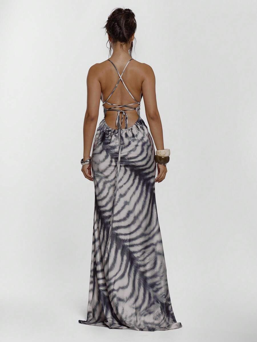 Rear view of zebra print sleeveless maxi dress with open crisscross back