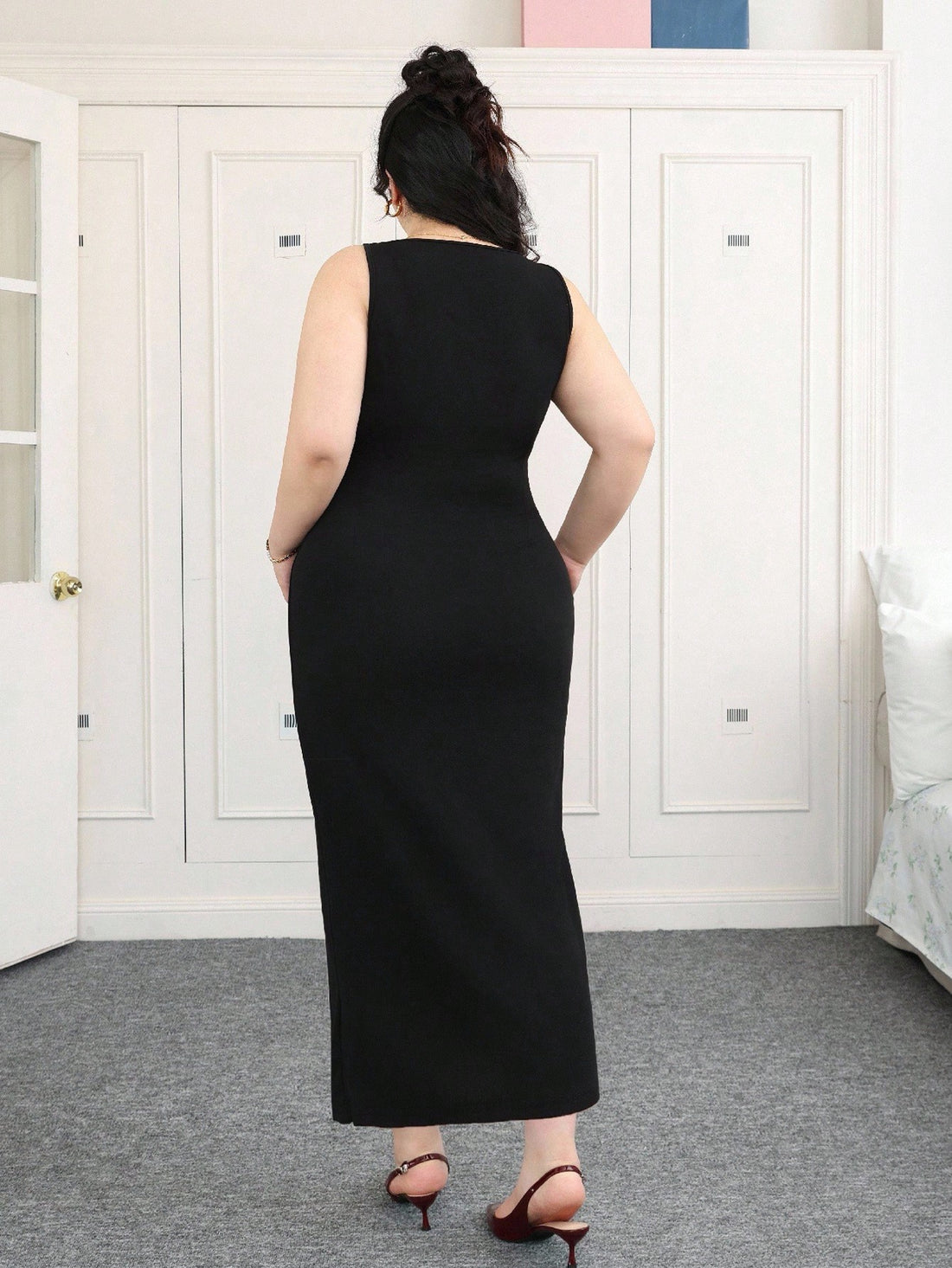 Slip into effortless summer style with this chic sleeveless dress designed for curves and confidence. The cinched waist creates a flattering silhouette while the subtle slit adds just the right touch of movement and flair. Perfect for casual outings, weekend brunches, or laid-back gatherings, this versatile piece transitions seamlessly from day to night. Breathable fabric keeps you cool when temperatures rise, while the elegant cut ensures you'll feel put-together without trying too hard. A wardrobe essenti