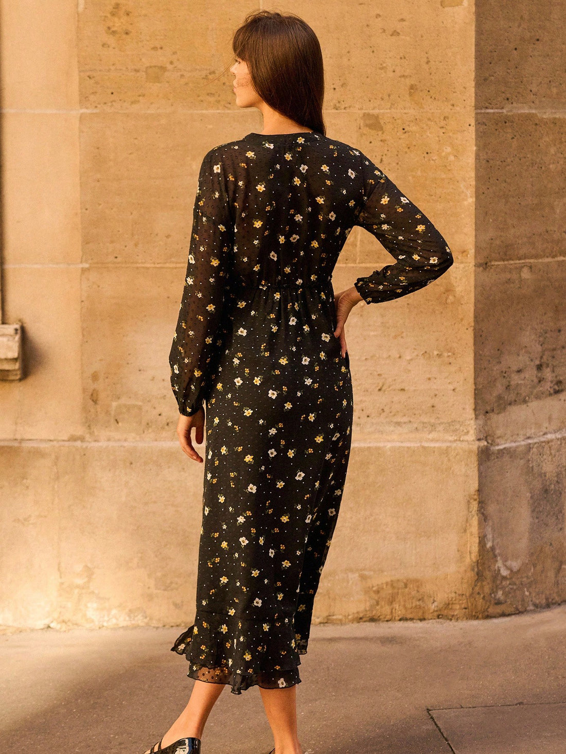 Bonjour! Embrace Parisian charm with this enchanting printed midi dress that whispers sophistication at every turn. The flattering V-neckline draws the eye upward while delicate ruffle details add a playful flutter to your silhouette. Perfect for transitioning through autumn and winter, this versatile piece pairs effortlessly with boots, blazers, or statement jewelry. The thoughtfully placed print brings visual interest without overwhelming your frame, making it ideal for everything from casual coffee dates