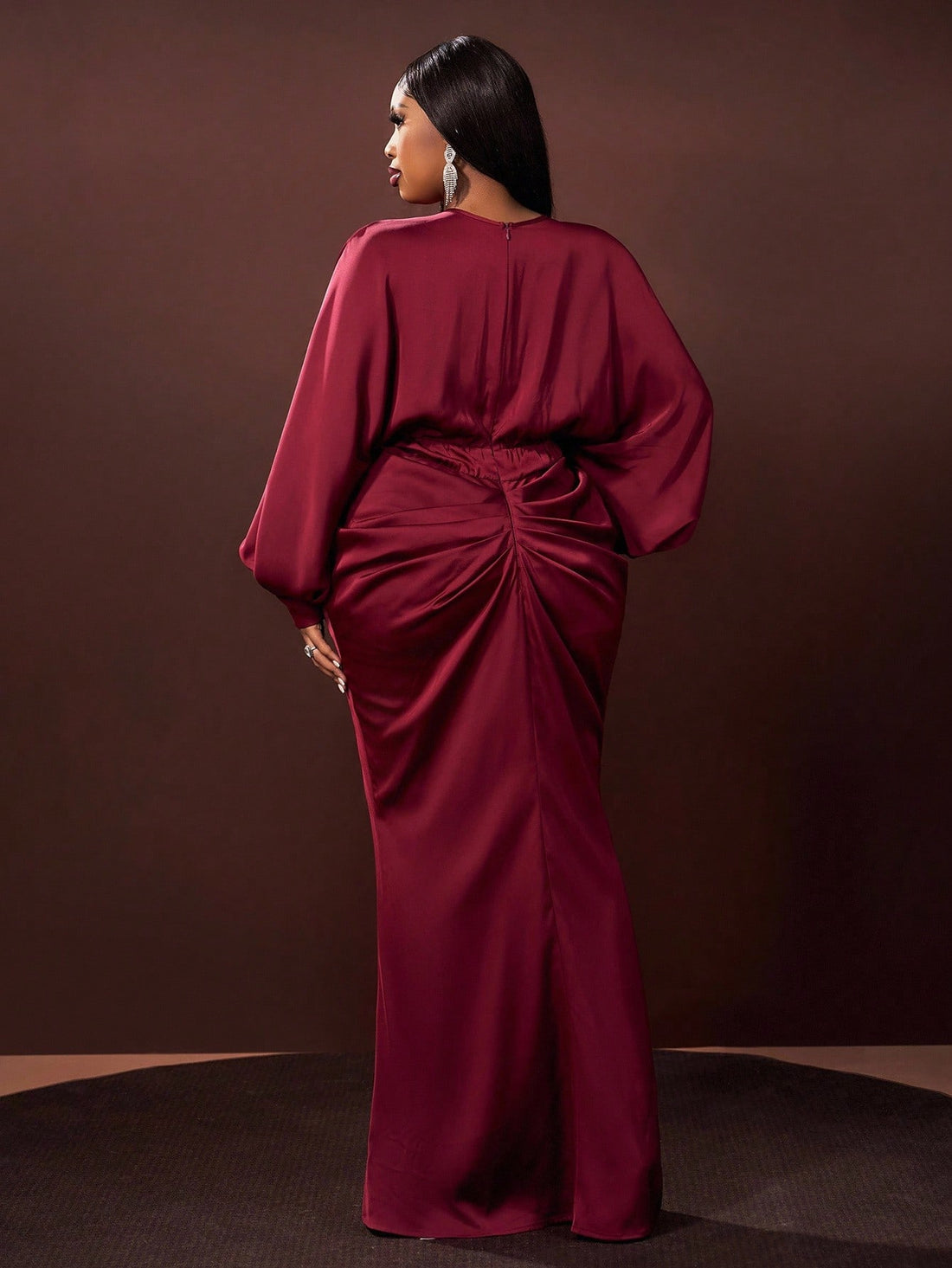 Slip into sophistication with this stunning satin maxi dress designed to make you feel absolutely fabulous. The flattering V-neckline draws the eye upward, while the ruched waist cinches beautifully to enhance your silhouette. A daring high slit adds movement and allure to every step. Crafted in luxurious satin that drapes elegantly, this plus-size beauty transitions seamlessly from autumn cocktails to winter galas. Whether you're celebrating in style or turning heads at your next event, this dress delivers