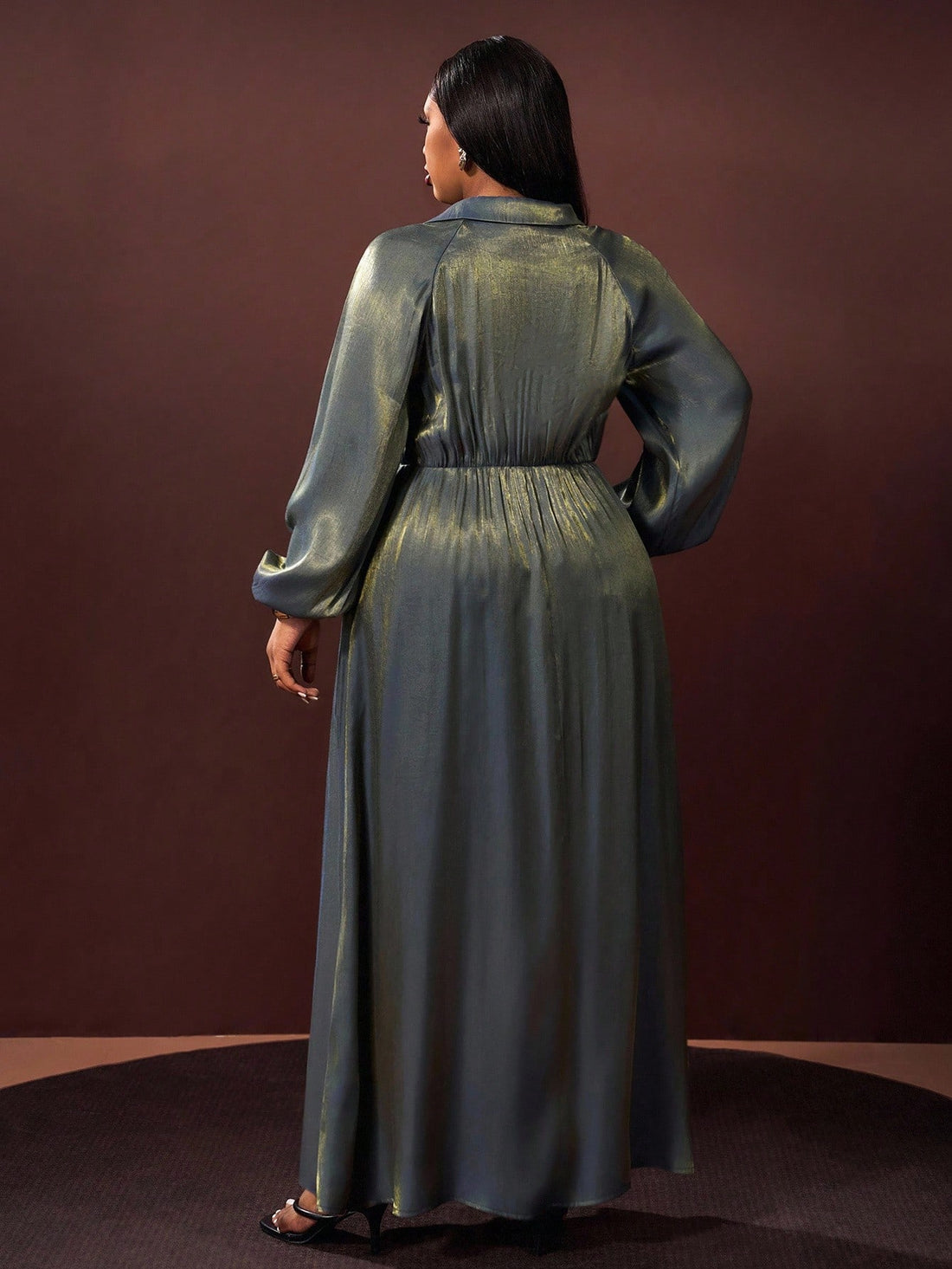 Step into the spotlight with this plus size maxi dress, crafted from iridescent Y2K-inspired fabric that shimmers wherever you go. Perfectly versatile, it’s designed to elevate your look whether you’re conquering a workday, dazzling at a party, or keeping it effortlessly chic every day. Flowy and flattering, this dress blends comfort with eye-catching style for all your standout moments.
