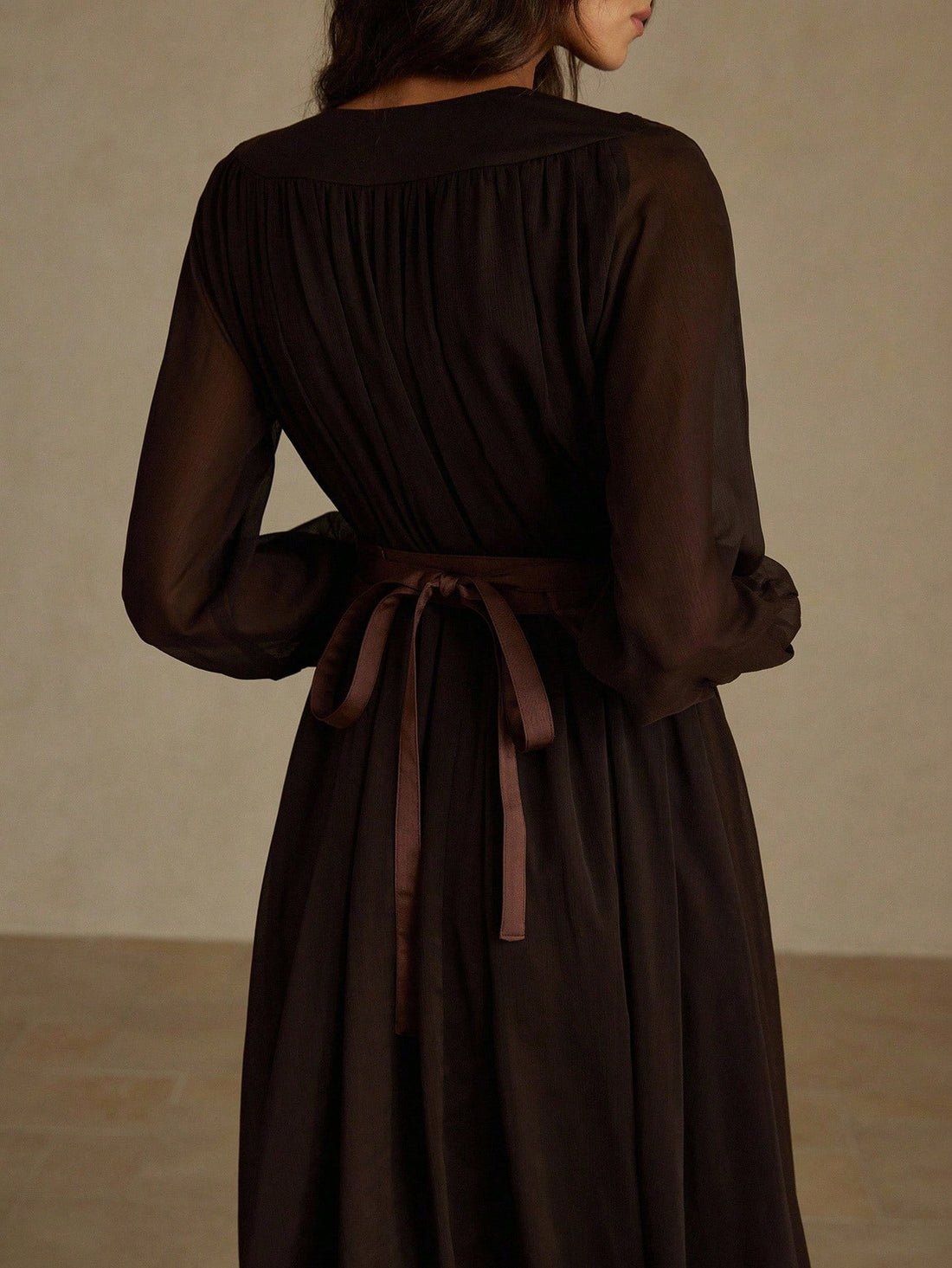 Slip into sophistication with this stunning V-neck satin dress—your new go-to for effortless elegance. The luxurious satin fabric drapes beautifully while the long sleeves keep you cozy through crisp autumn and winter days. Perfect for the office, weekend brunches, or anywhere you want to look polished without trying too hard. Versatile enough to dress up with heels or down with sneakers, this wardrobe essential transitions seamlessly from season to season. Because looking fabulous shouldn't feel like work.