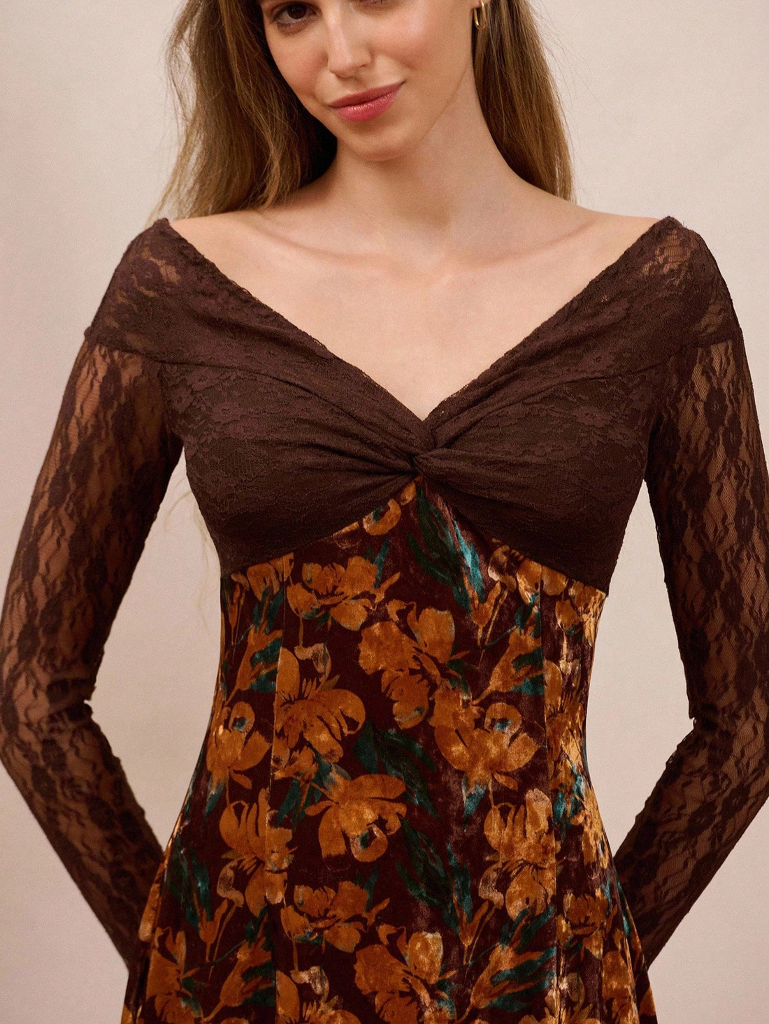 Elevate your wardrobe with this stunning brown floral mini dress that's equal parts sophisticated and fun! The delicate lace long sleeves add a touch of romance while keeping you cozy through cooler months. Whether you're heading to the office, dancing the night away at a party, or attending a winter gathering, this versatile piece transitions effortlessly from day to night. The charming floral pattern brings life to any occasion, while the flattering mini silhouette ensures you'll feel confident and fabulo