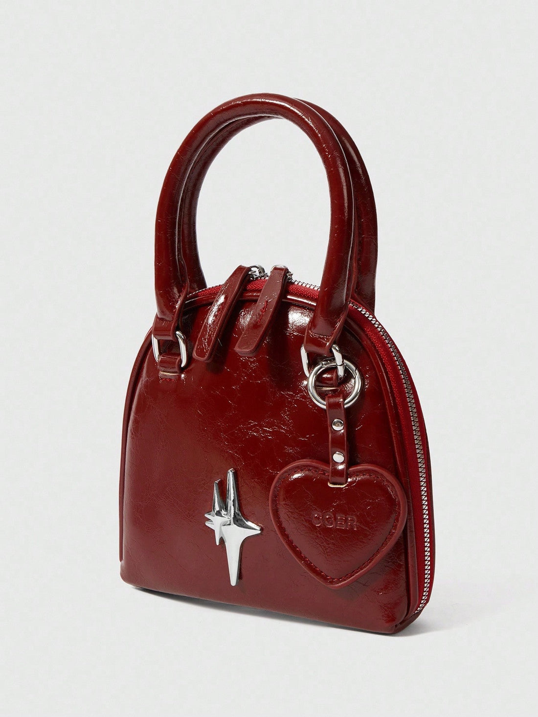 Steal hearts this Valentine's Day with our adorable burgundy heart-shaped clamshell bag! This charming accessory combines romance with practicality, featuring a secure clamshell closure that keeps your essentials safe while turning heads. The rich burgundy hue adds a touch of sophistication to any outfit, whether you're dressing up for date night or keeping it casual. Perfect for gifting to that special someone—or treating yourself to a little love. Compact yet spacious enough for your phone, cards, and eve