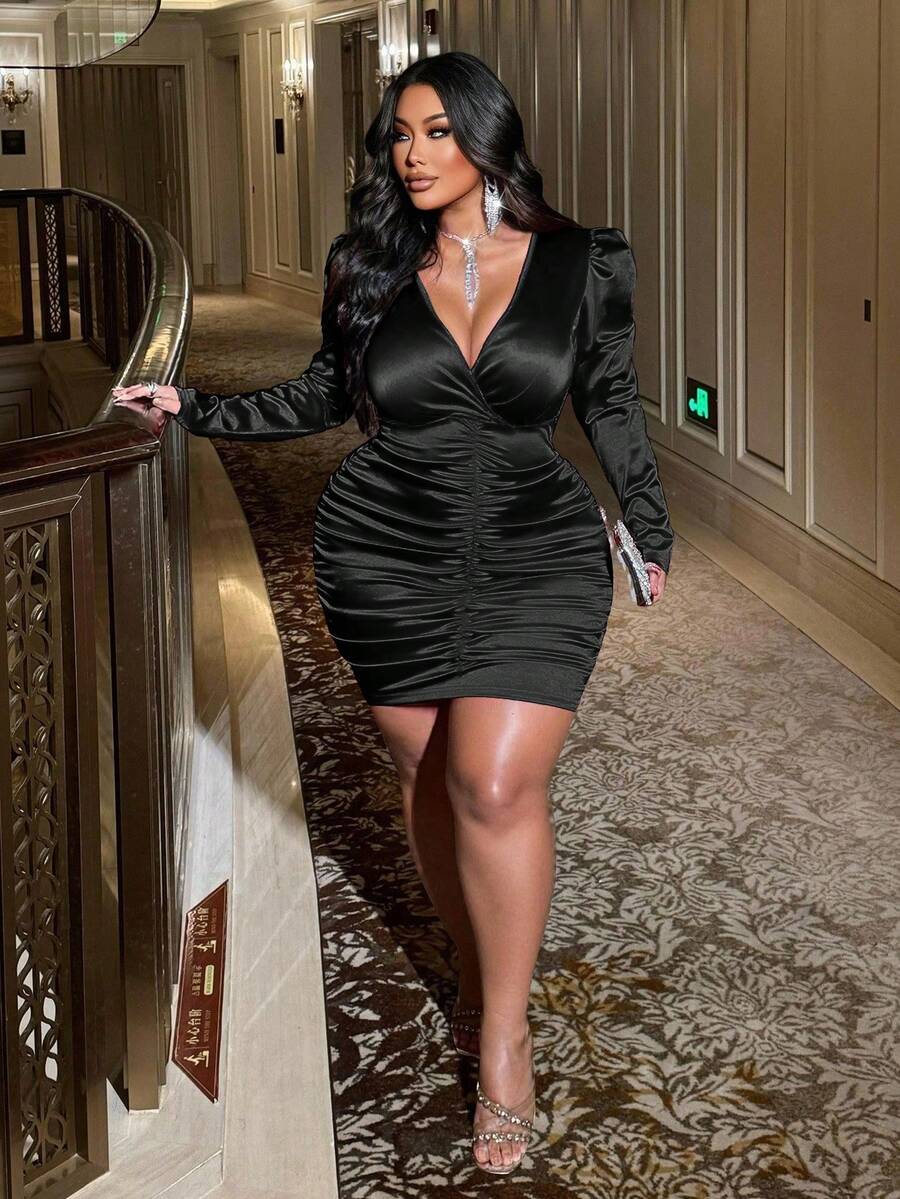 Embrace your curves with this Plus Size Deep V-Neck Ruched Dress that blends style and sass effortlessly. The solid color and flattering ruching highlight your silhouette, while the plunging neckline adds just the right amount of sexy charm. Perfect for turning heads at any event, it’s your go-to dress for feeling confident and playful all day or night.