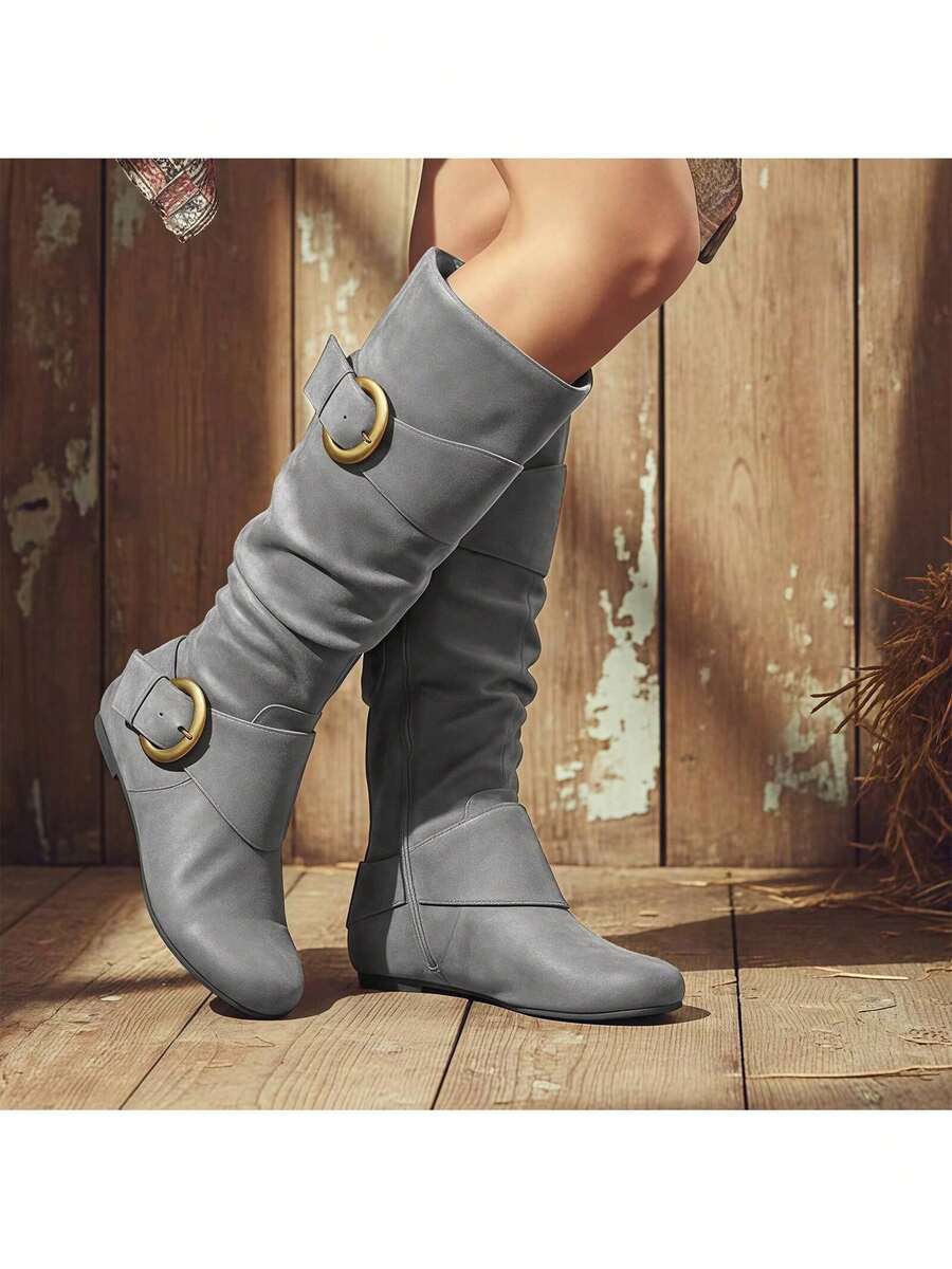 Step into effortless style with these slouchy mid-calf boots that strike the perfect balance between comfort and edge. Featuring a round toe, flat heel, and convenient side zip closure, they're designed for easy on-and-off wear. The decorative buckle detail adds a touch of personality to any outfit, while the relaxed silhouette pairs beautifully with everything from skinny jeans to flowing dresses. Whether you're running errands or heading out for the evening, these versatile boots deliver that coveted laid