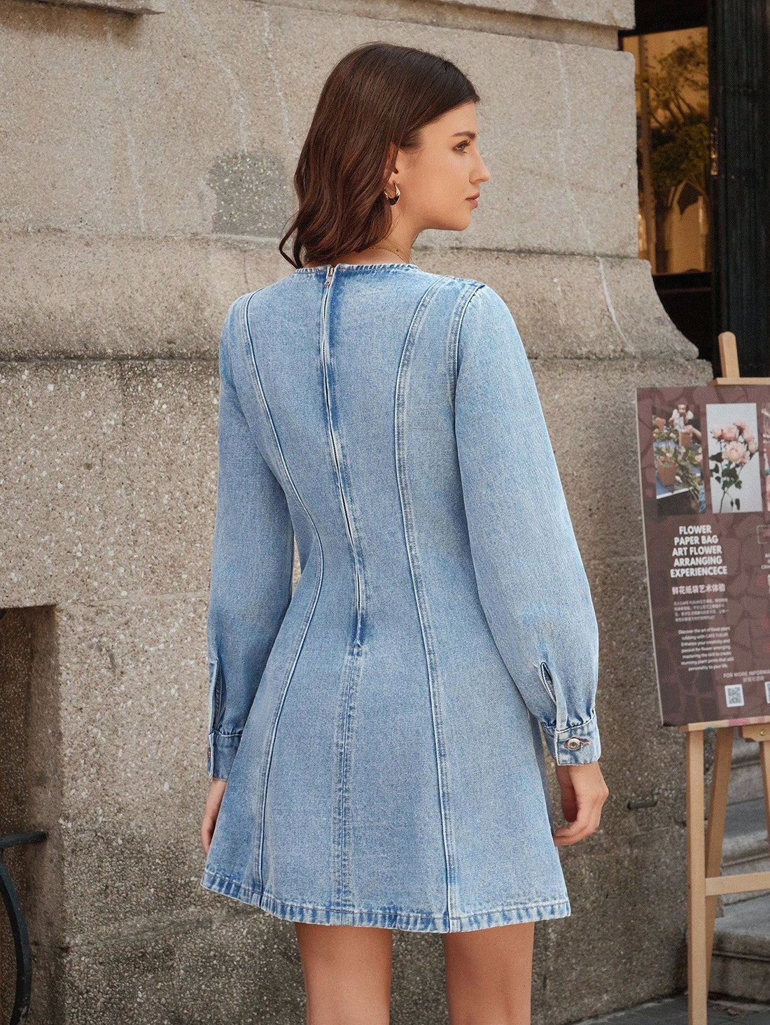 Effortlessly chic and oh-so-versatile, this denim dress is your new wardrobe MVP. The classic round neckline and long sleeves strike the perfect balance between casual comfort and put-together style. Crafted from timeless denim, it's the kind of piece you'll reach for again and again—whether you're running errands, meeting friends, or keeping it low-key. Dress it up with boots and jewelry or keep it relaxed with sneakers. One dress, endless possibilities.