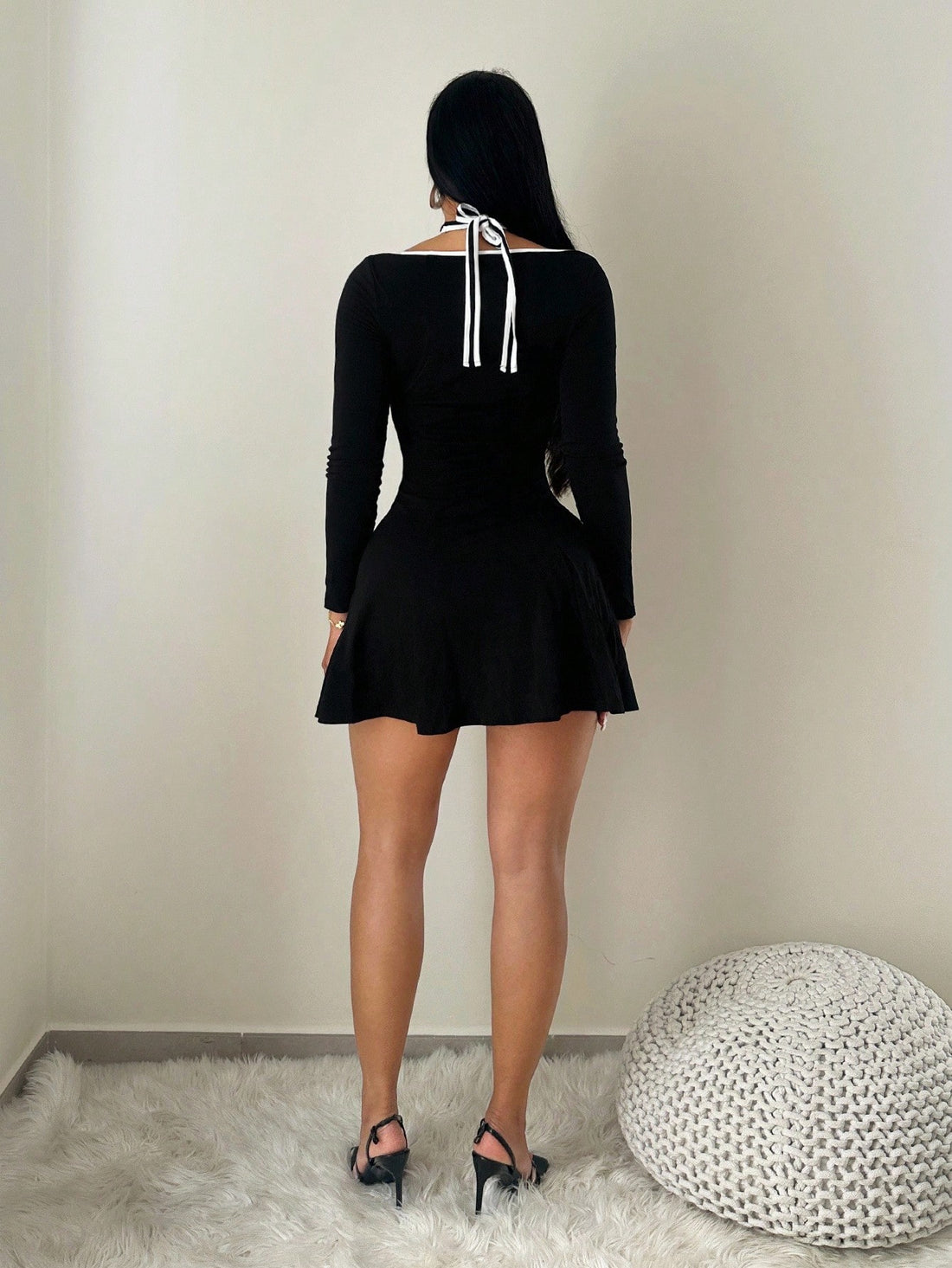 Elevate your autumn wardrobe with this charming off-shoulder dress that effortlessly blends sophistication with casual comfort. The romantic tie-up neckline and flowing long sleeves create an enchanting silhouette, while the princess split adds a playful touch of movement and flair. Perfect for weekend adventures, coffee dates, or cozy fall gatherings, this versatile piece transitions seamlessly from day to night. The off-shoulder design flatters every frame, making you feel confident and fabulous no matter