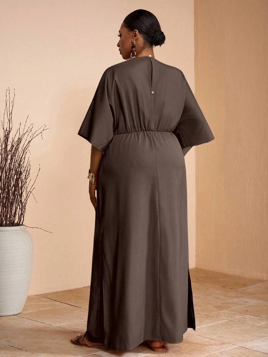 Effortlessly chic meets wonderfully versatile with this khaki maxi dress that's ready for anything. The flattering V-neckline and charming shoulder ties add just the right touch of elegance, while the flowing silhouette keeps you comfortable whether you're lounging by the pool or exploring a new city. Dress it up with heels for evening adventures or keep it casual with sandals for everyday ease. This wardrobe essential transitions seamlessly from vacation mode to your regular rotation—because looking fabulo