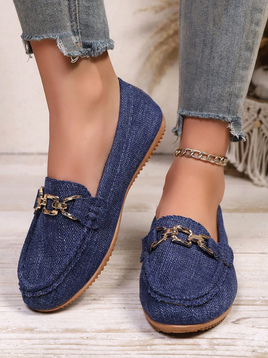 Step into effortless style with these plus-size slip-on loafers designed for women who refuse to compromise on comfort. Crafted in a soft light blue, these lightweight flats glide on in seconds—perfect for busy mornings, airport runs, or lazy weekend strolls. The versatile casual design pairs seamlessly with everything from jeans to dresses, making them your go-to shoe for any occasion. Whether you're commuting to work or jet-setting on vacation, these loafers keep your feet happy all day long. No fuss, no 