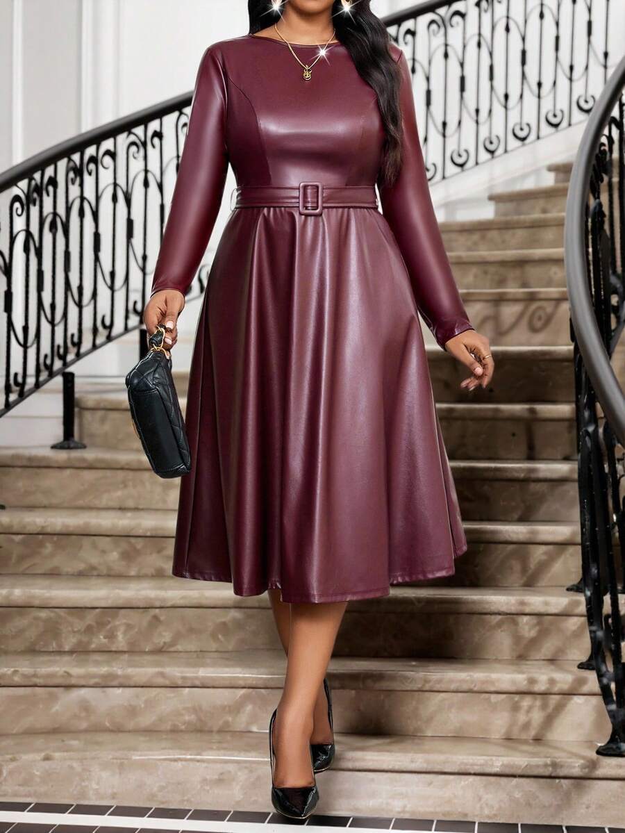 Elevate your winter wardrobe with this stunning plus-size A-line belted dress that effortlessly combines sophistication with sass. The rich wine and black color combo is giving timeless elegance, while the cinched waist belt creates a flattering silhouette that celebrates your curves. Perfect for holiday parties, date nights, or whenever you want to feel absolutely fabulous. This versatile piece transitions seamlessly from day to evening, proving that chic never goes out of style—no matter the season or siz