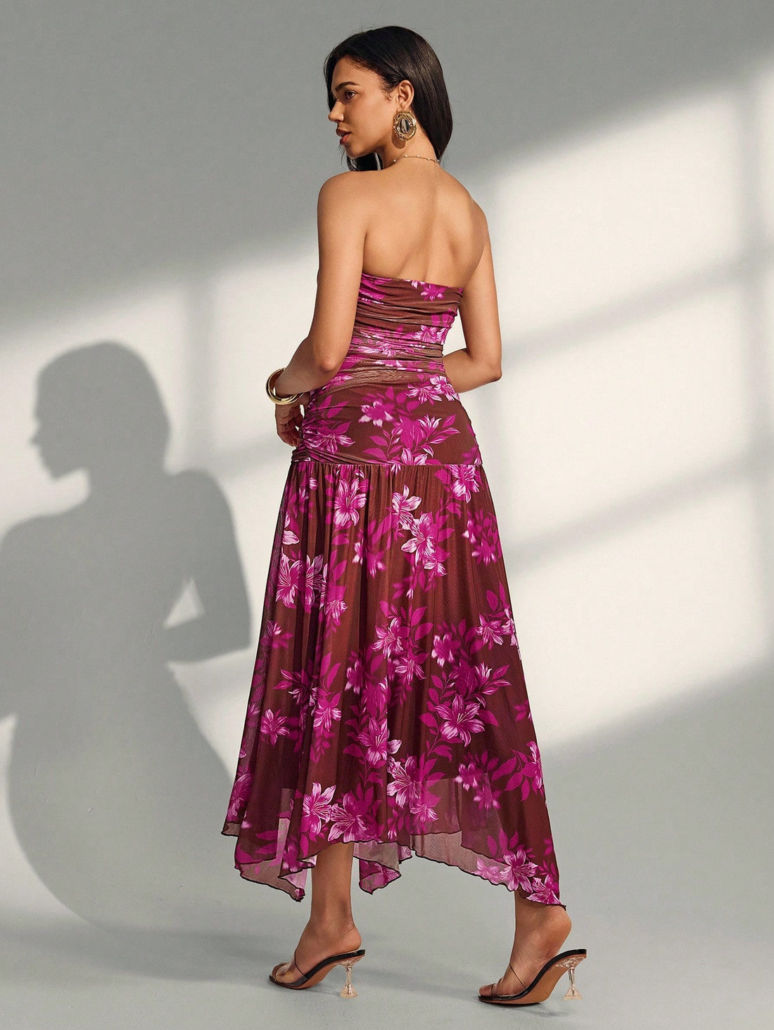 Escape to paradise in this stunning strapless floral dress that's basically a vacation in fabric form. The vibrant botanical print brings instant tropical vibes, while the elegant strapless design keeps things chic and effortless. Whether you're sipping cocktails by the ocean or exploring a charming coastal town, this versatile piece transitions seamlessly from beach days to sunset dinners. The flowing silhouette flatters every figure and moves beautifully in the breeze. Pack it, wear it, love it—your beach