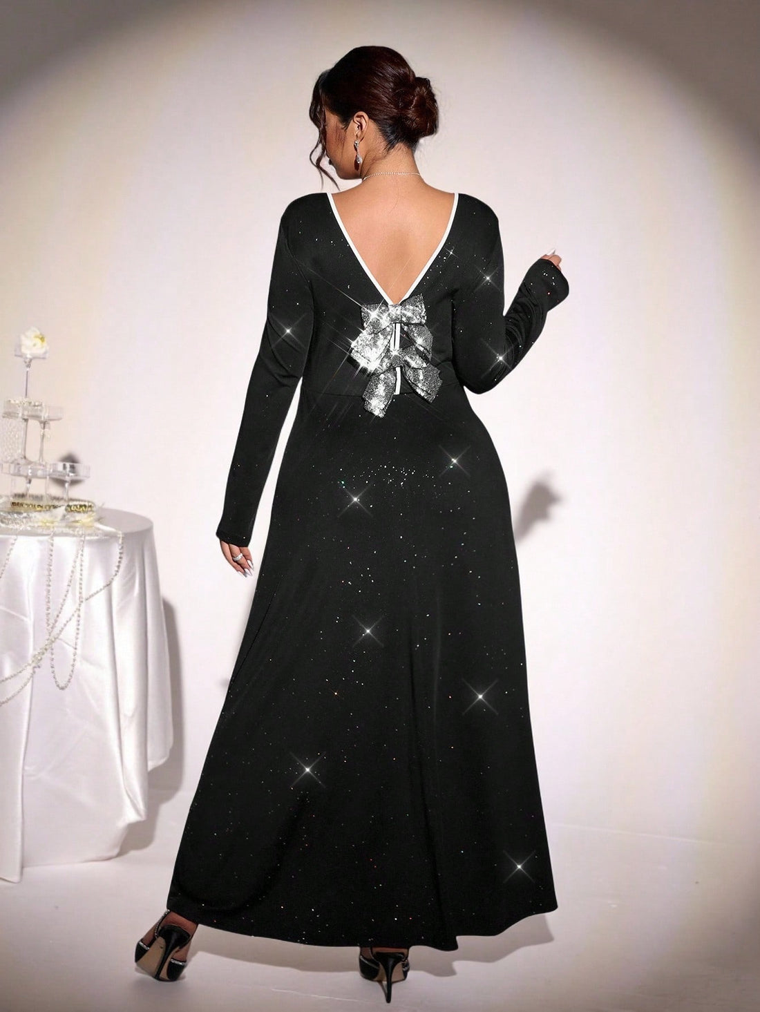 Get ready to sparkle and turn heads in this Chic Plus Size V-Neck Sequin Dress! Perfect for elegant parties or romantic date nights, its flared hem adds a fun, flirty flair while the stretchy fabric keeps you comfy all night long. Shine bright and dance with confidence in a dress designed to flatter and celebrate your curves!